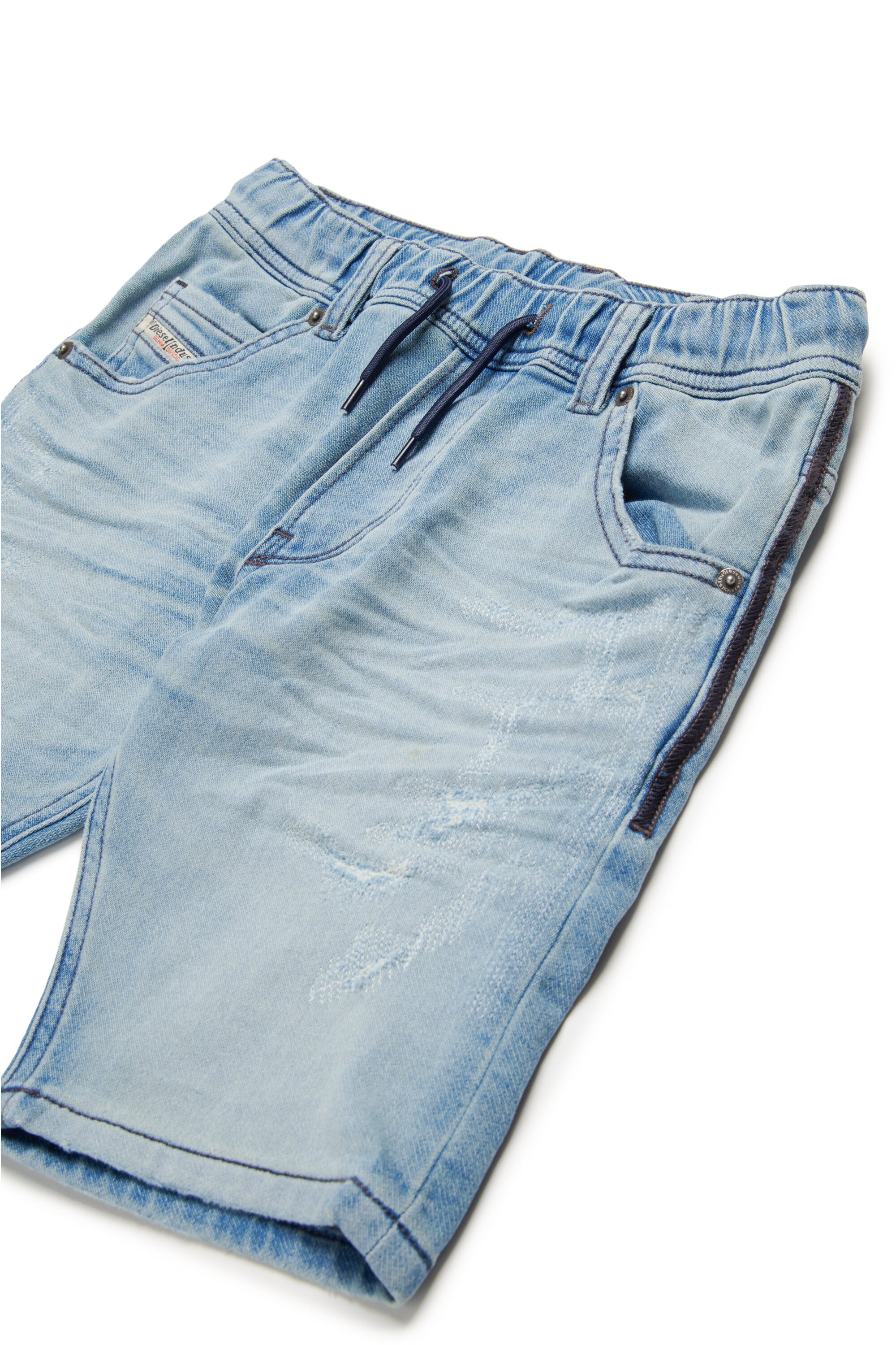 Shorts in JoggJeans® chiaro con rotture