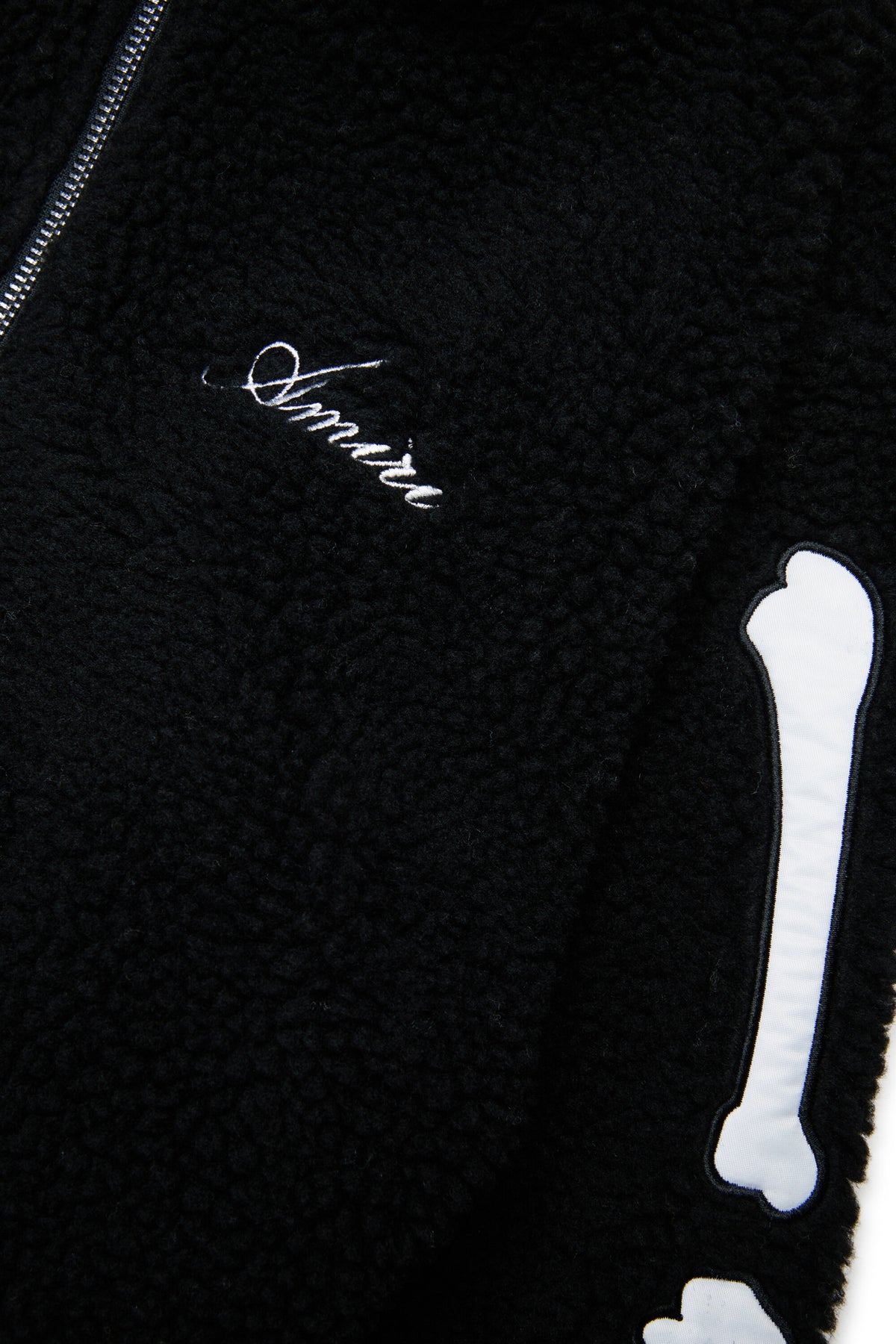 Chaqueta teddy con detalles de huesos