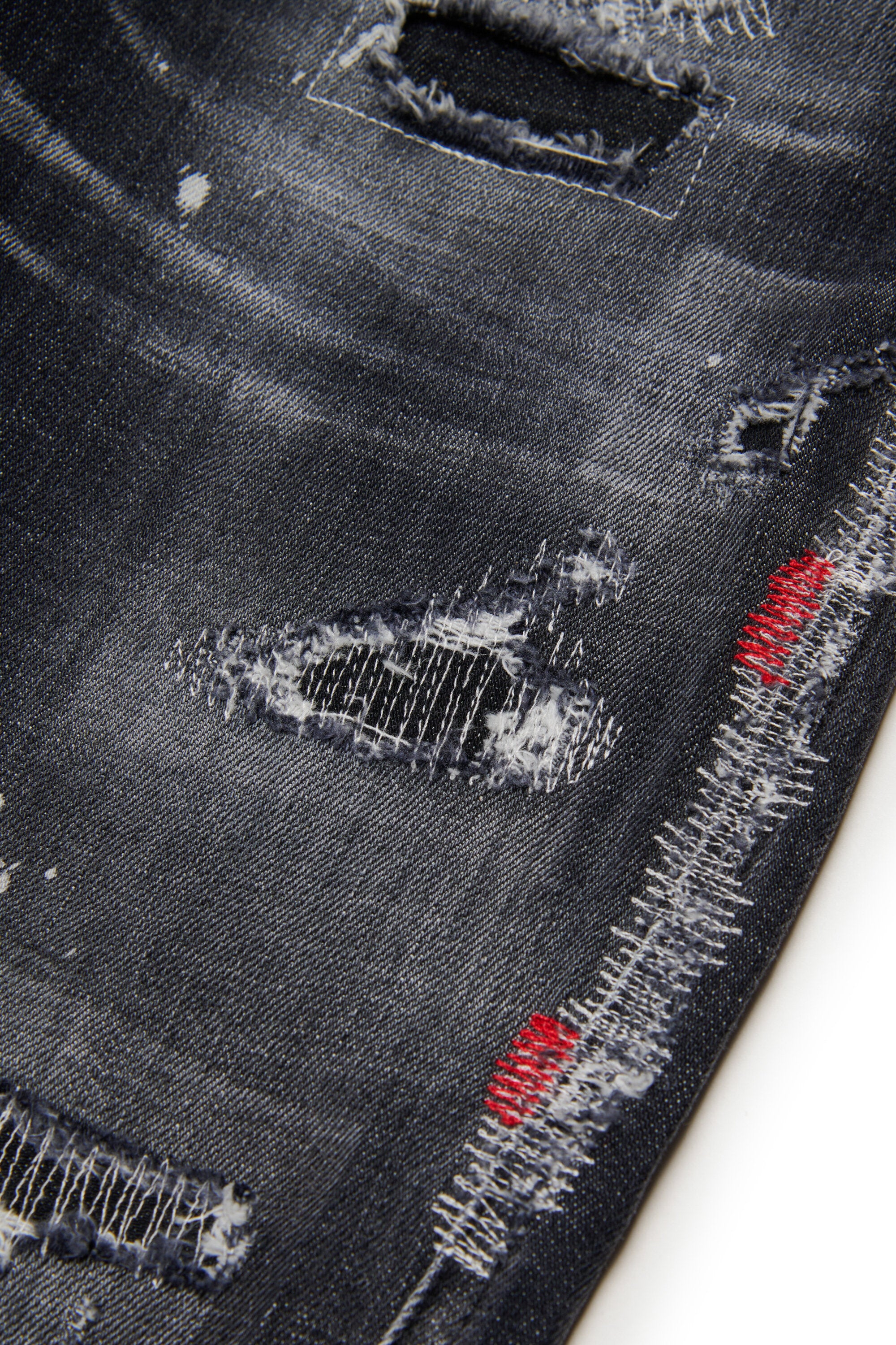 Jeans regular lavaggio nero effetto used