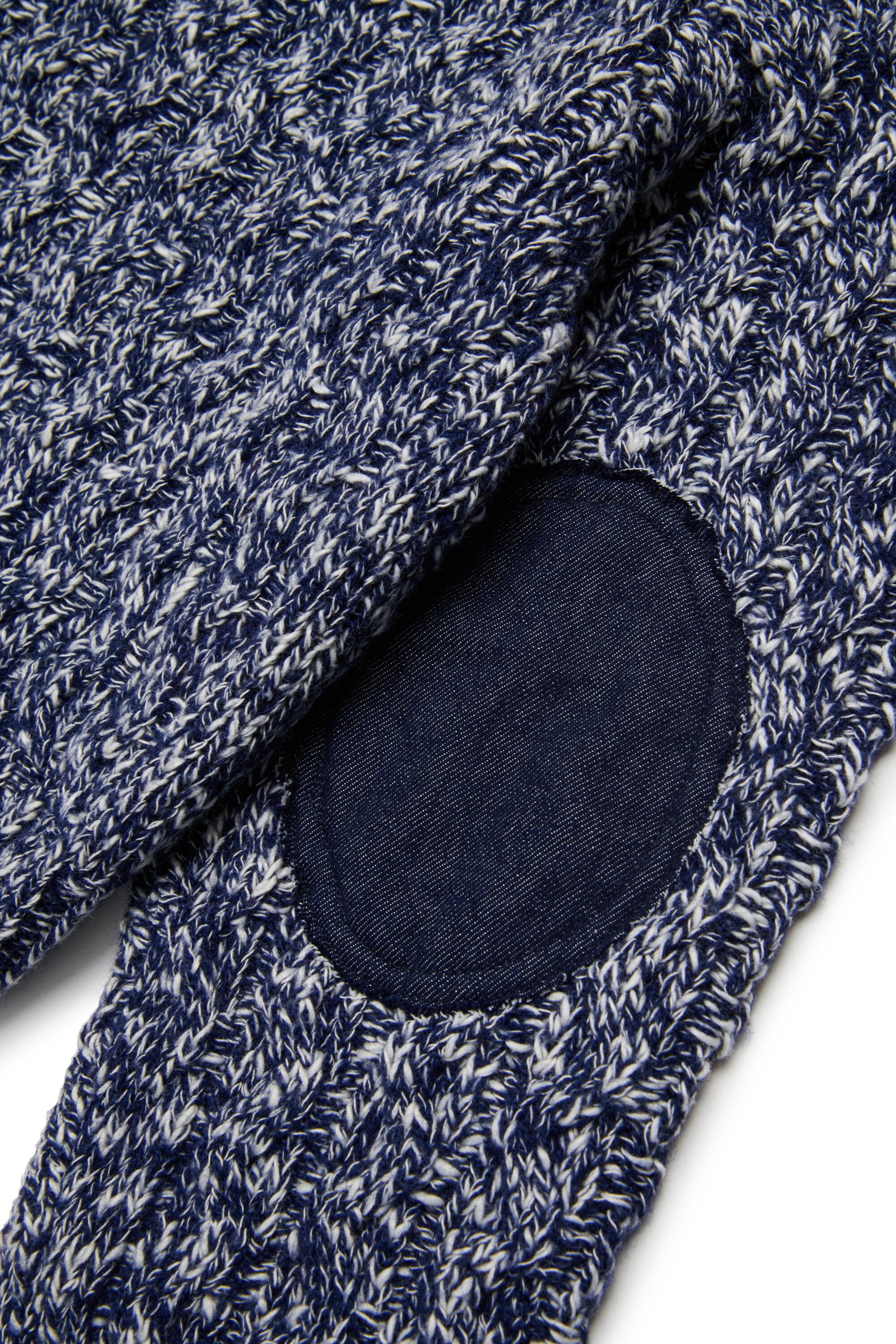 Pullover in misto lana a trecce