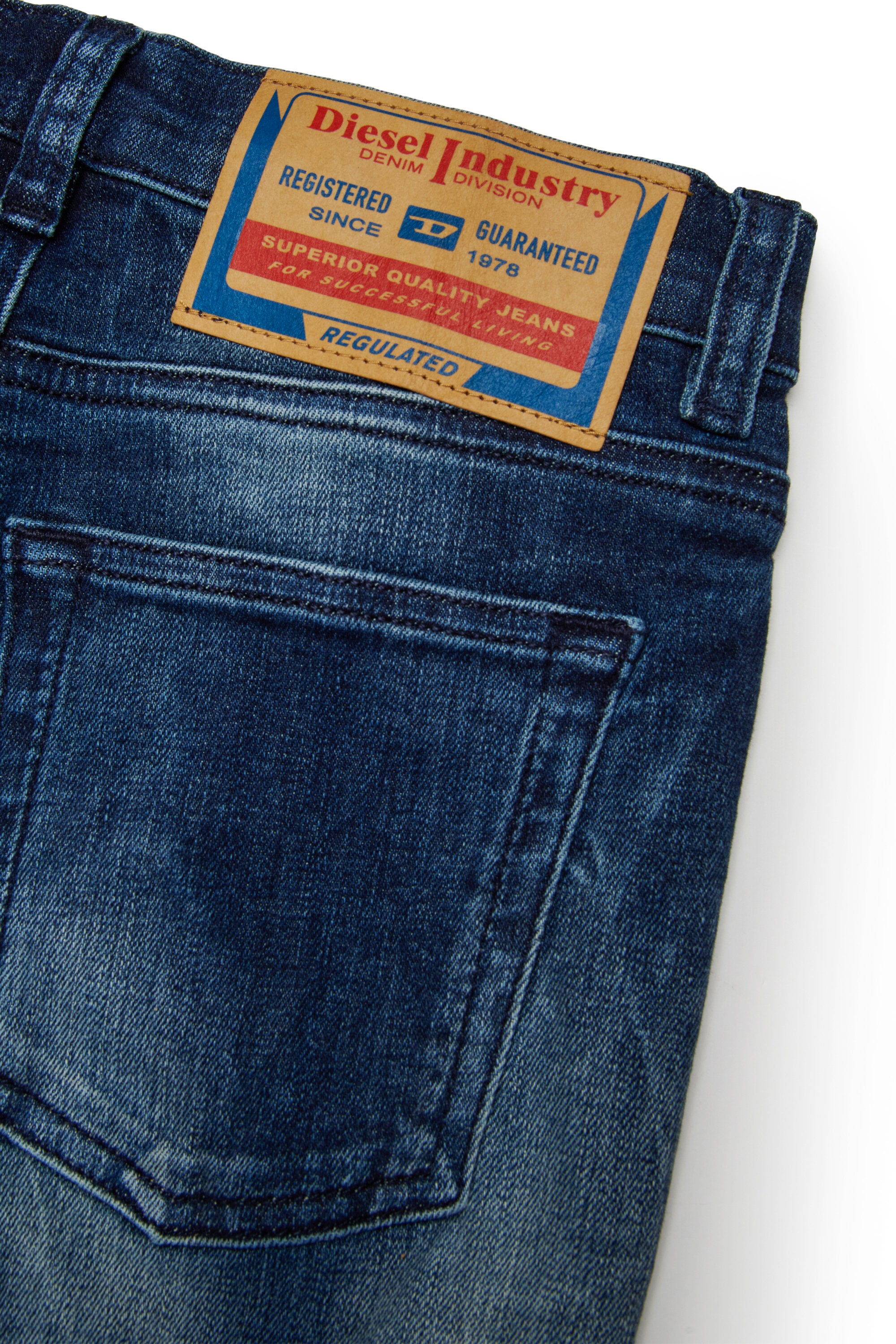 Jeans regular blu scuro con rotture - 2010