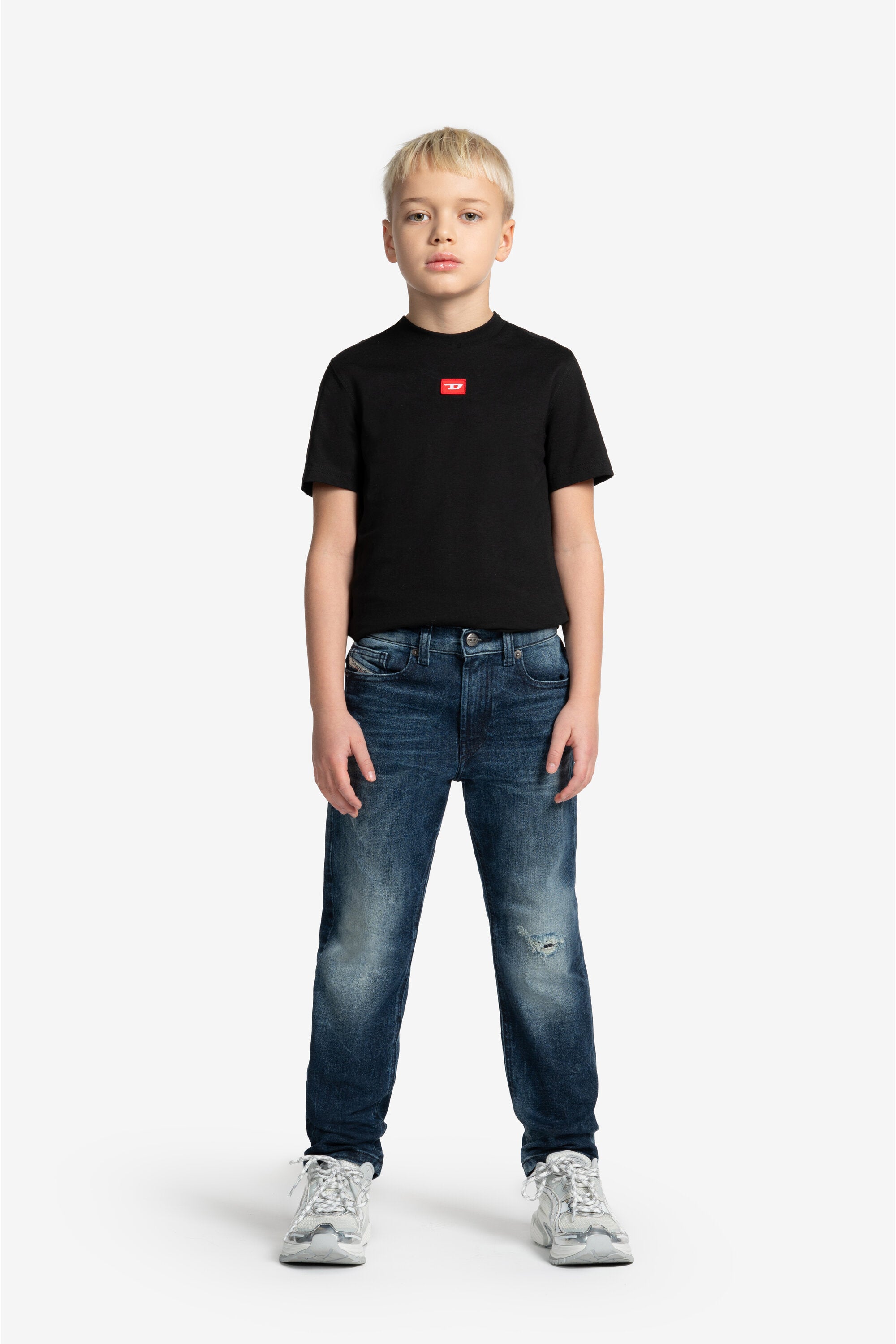 Jeans regular blu scuro con rotture - 2010