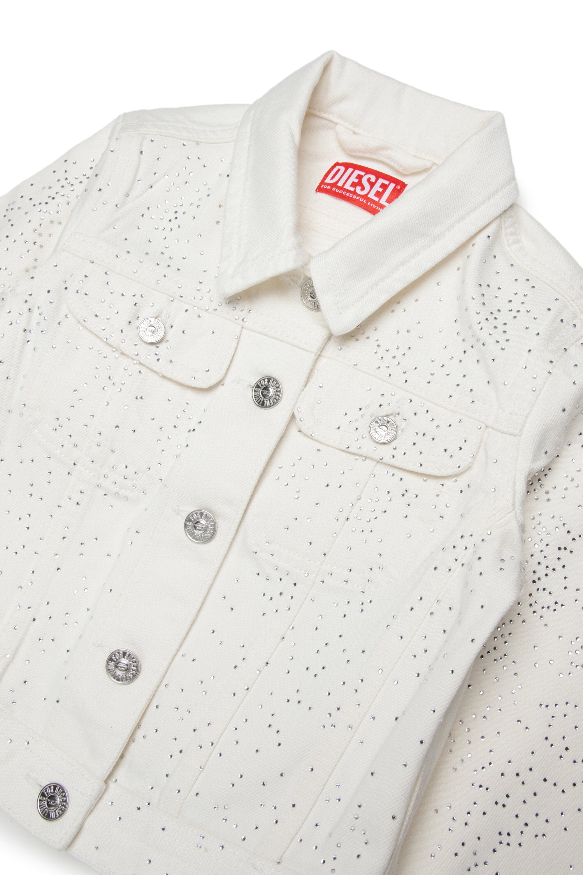 Denimjacke mit Allover-Mikronieten