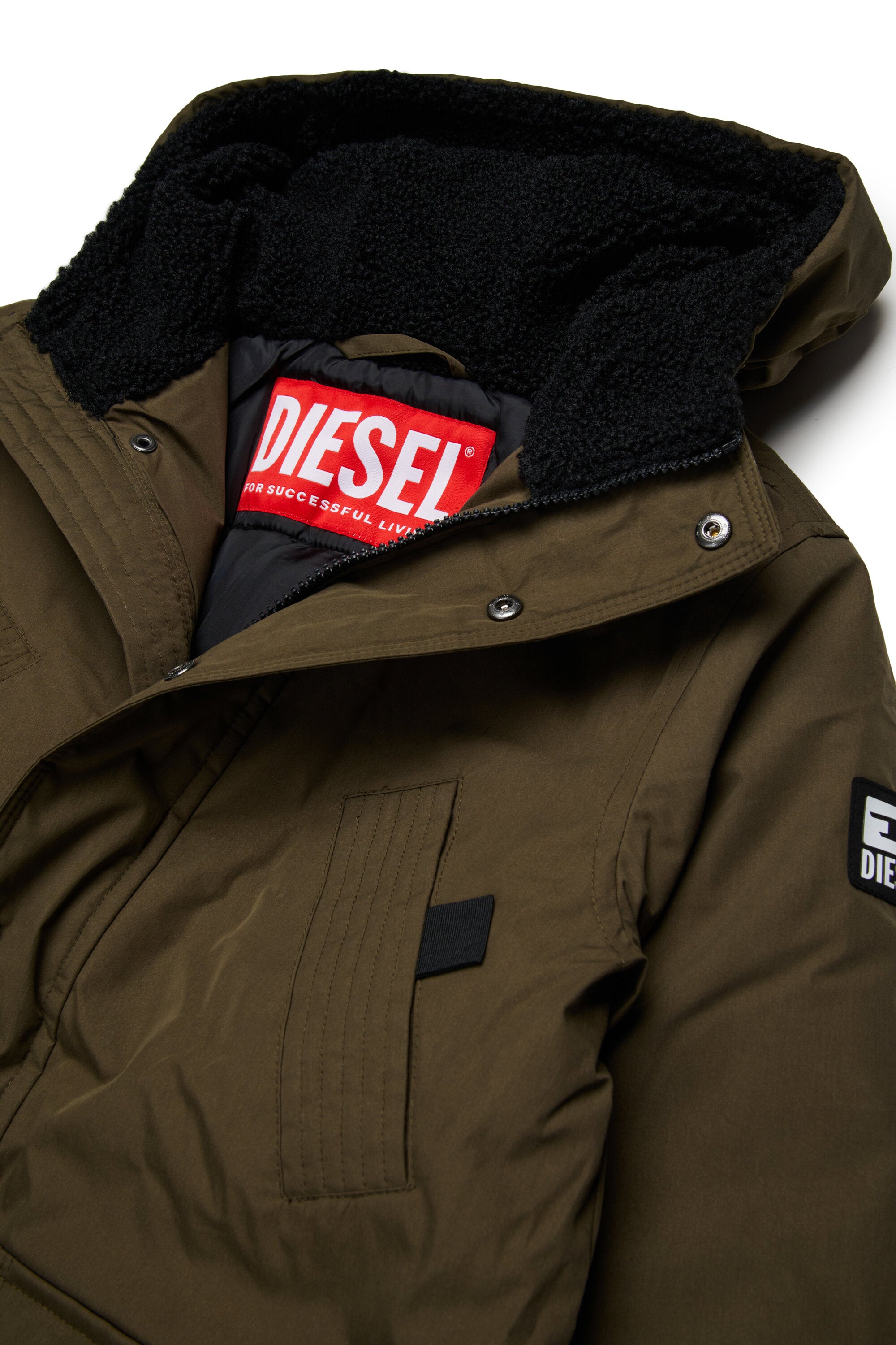 Lange gepolsterte Jacke mit Vordertaschen