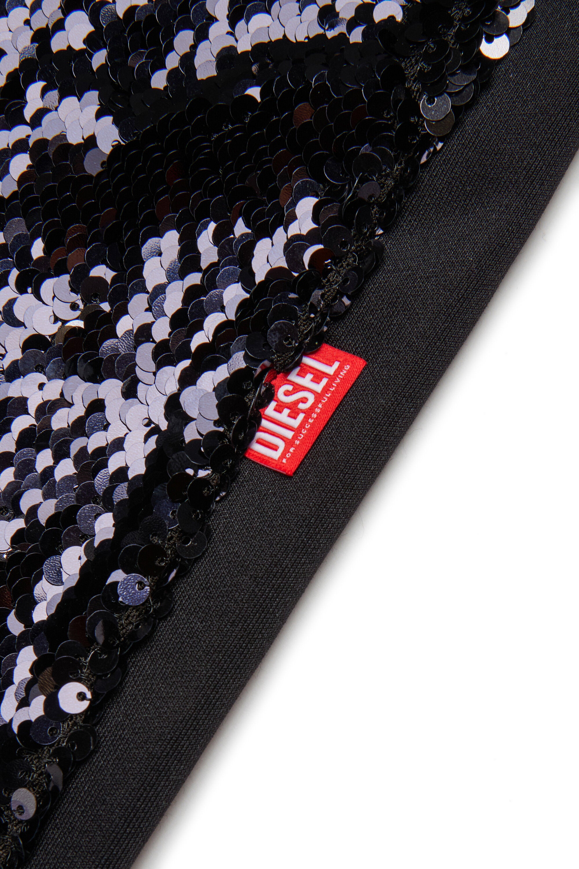 Pantalon flare à paillettes