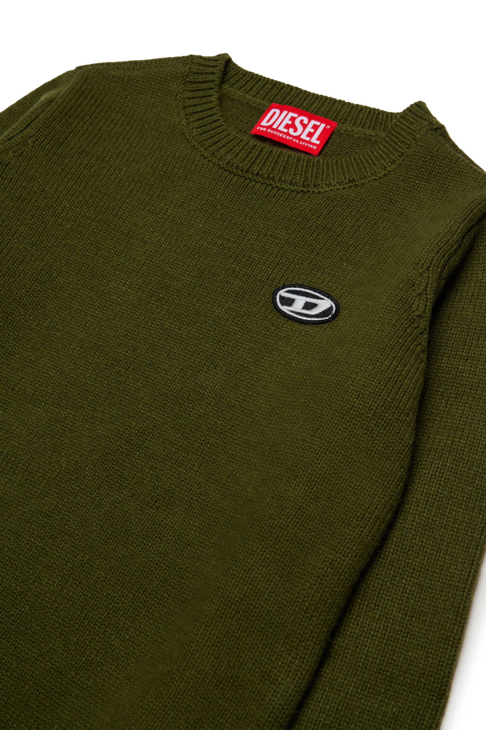 Pull en laine et cachemire mélangés avec des patchs