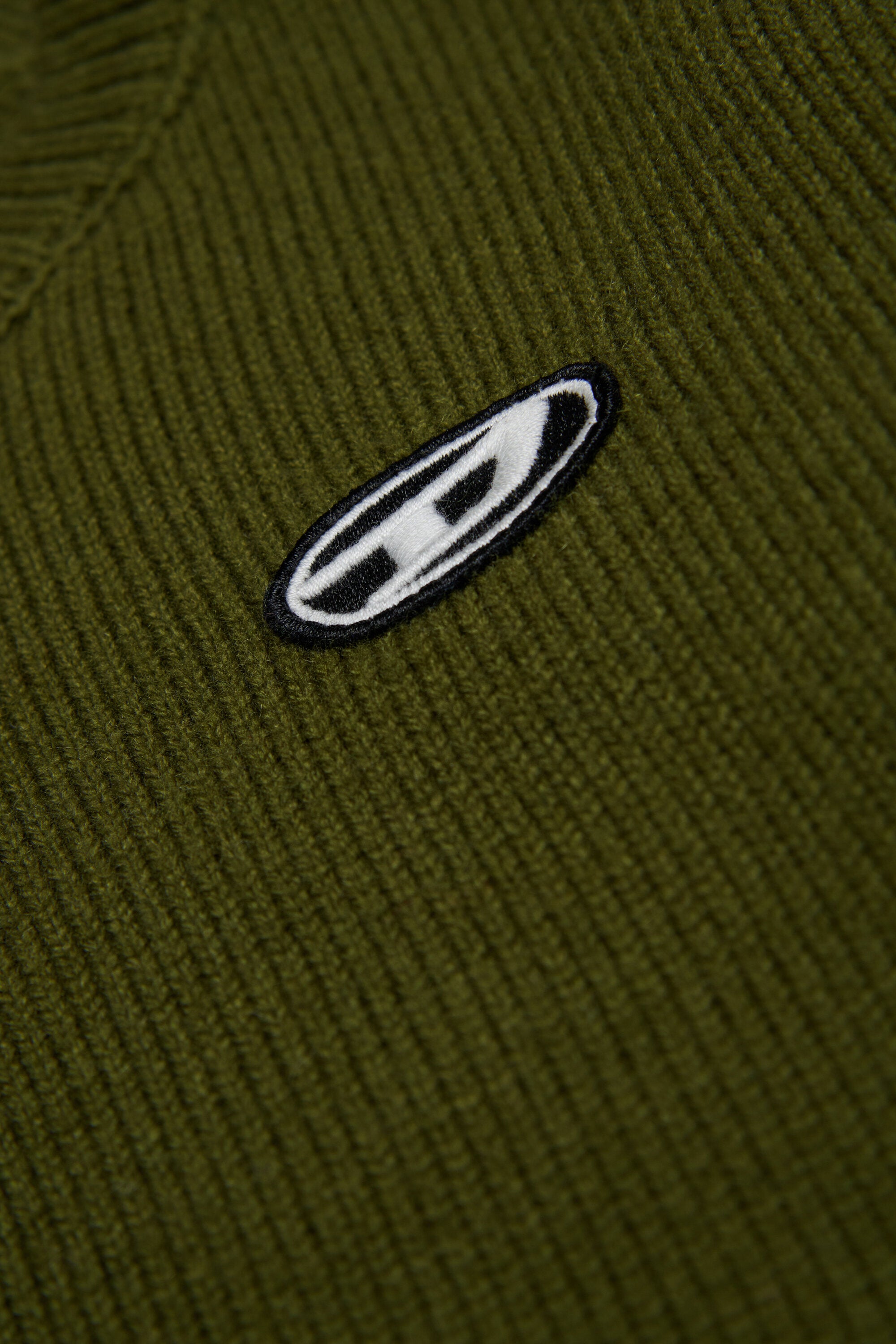 Pull en laine et cachemire mélangés avec des patchs