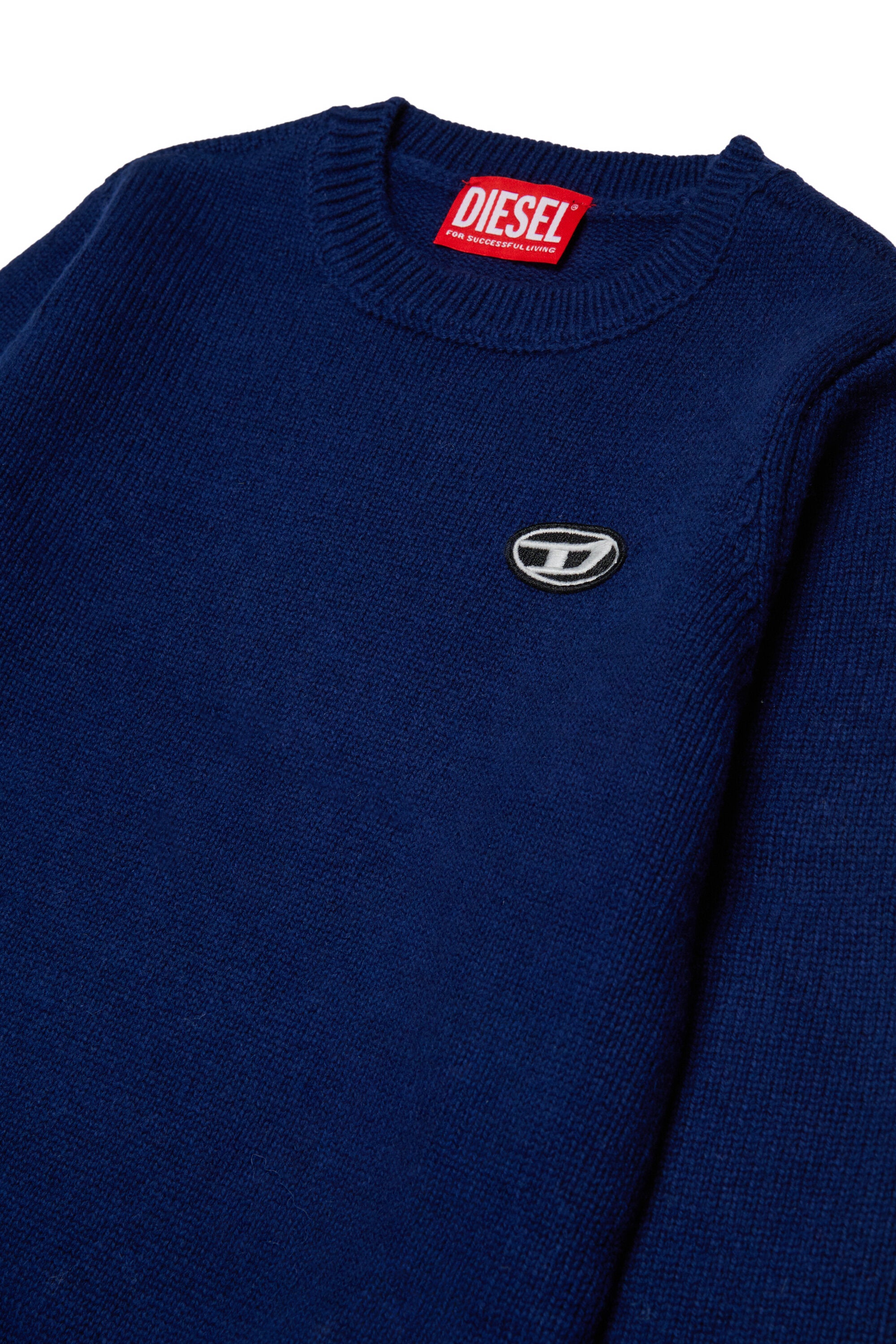 Pullover aus Wolle und Kaschmir mit Patches