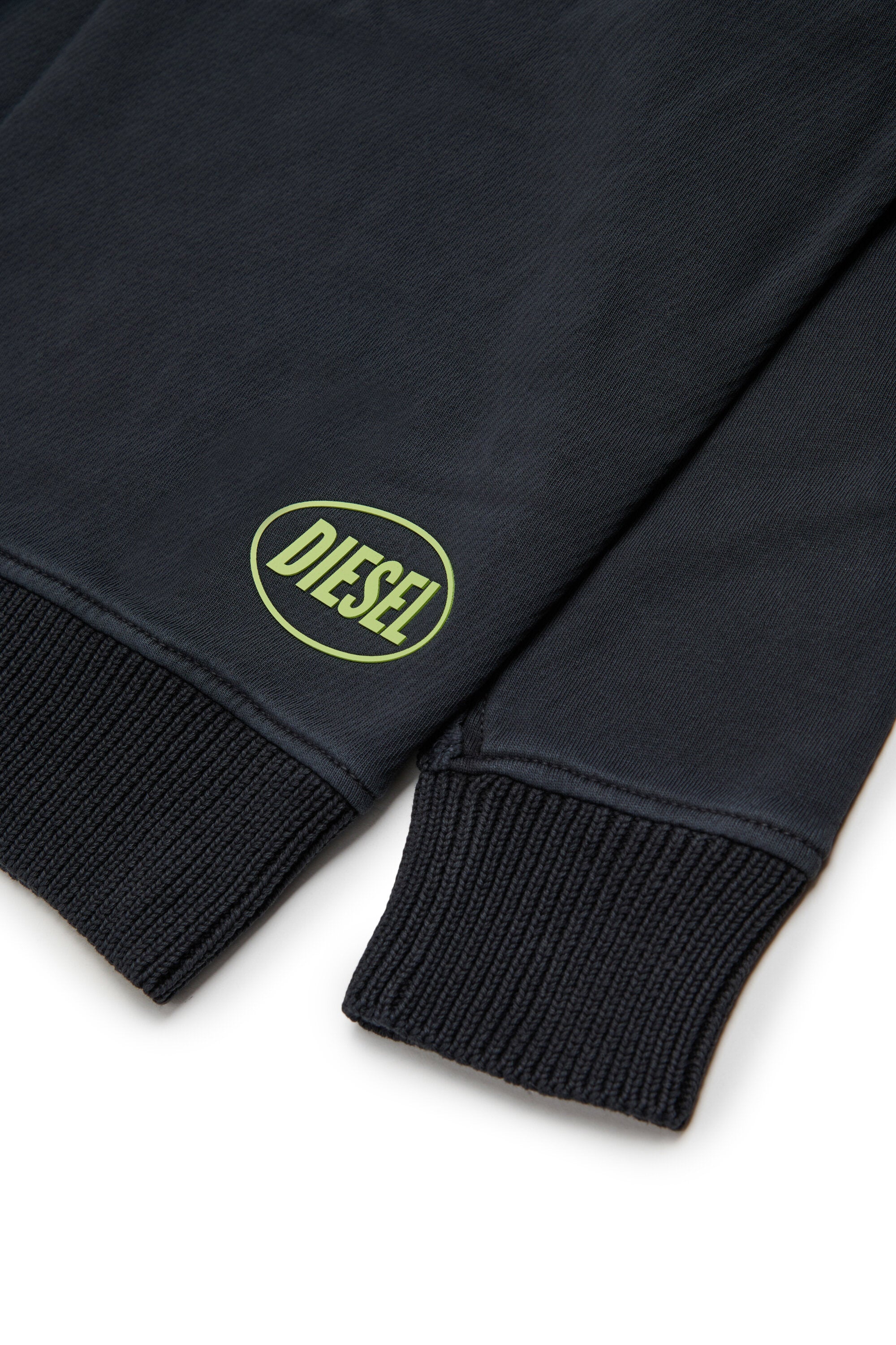 Chandail en molleton et en tricot à effet usé