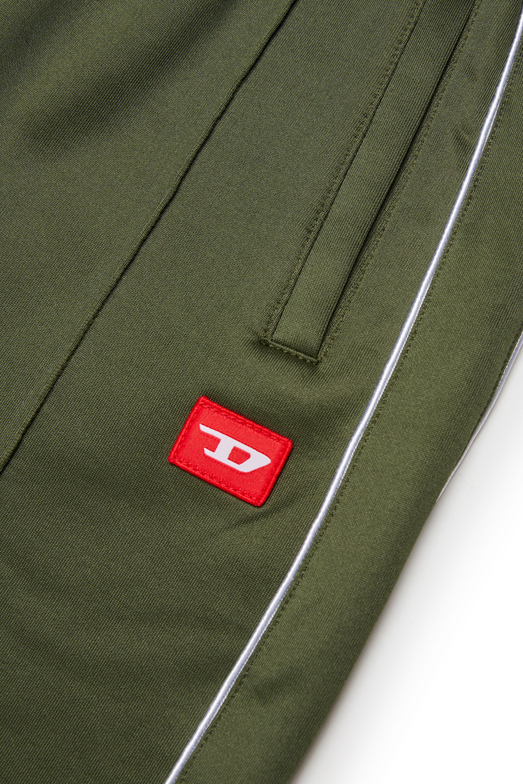 Pantaloni balloon in triacetato con patch D rossa