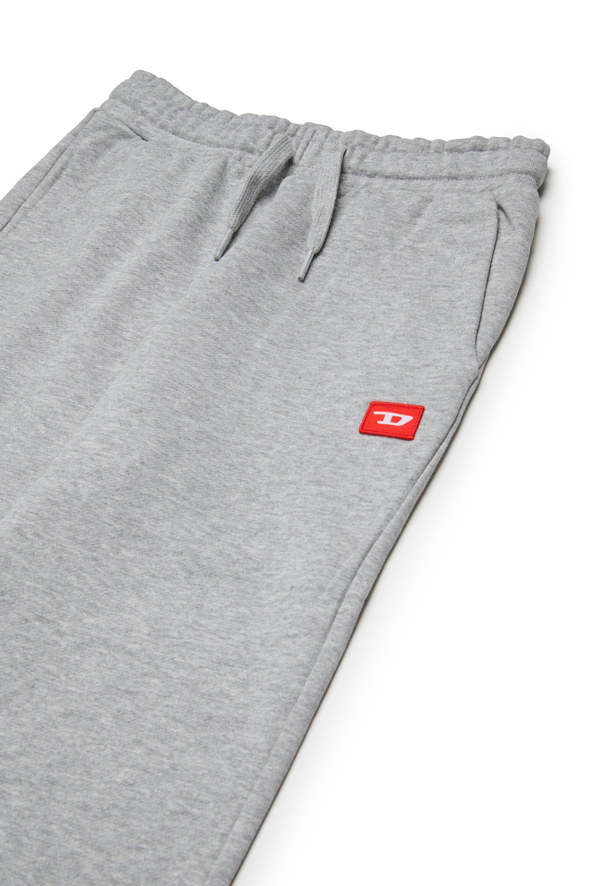 Pantaloni jogger con patch D rossa