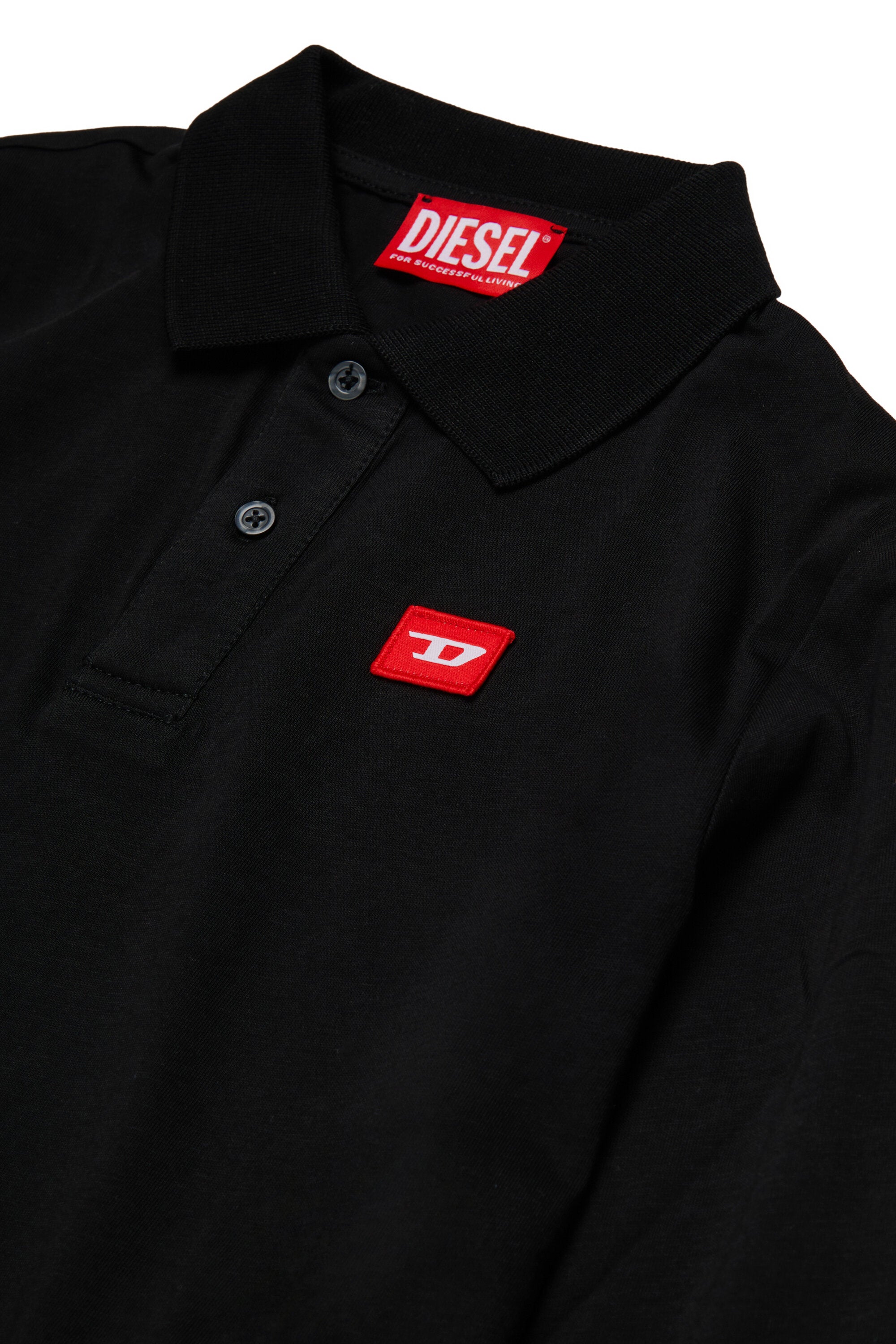 Jersey-Poloshirt mit rotem "D"-Aufnäher
