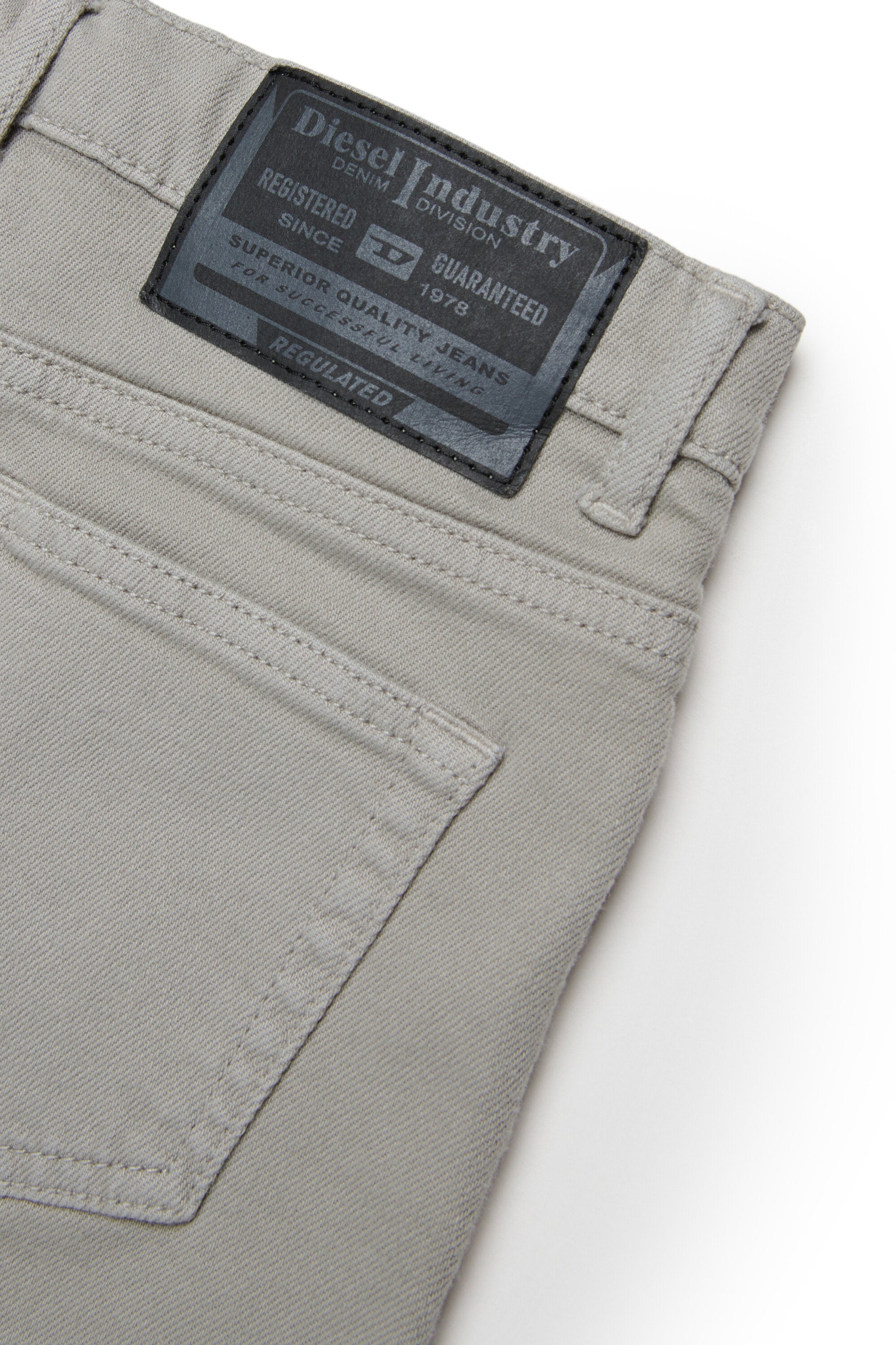 Gonna mini laminata effetto sfrangiato