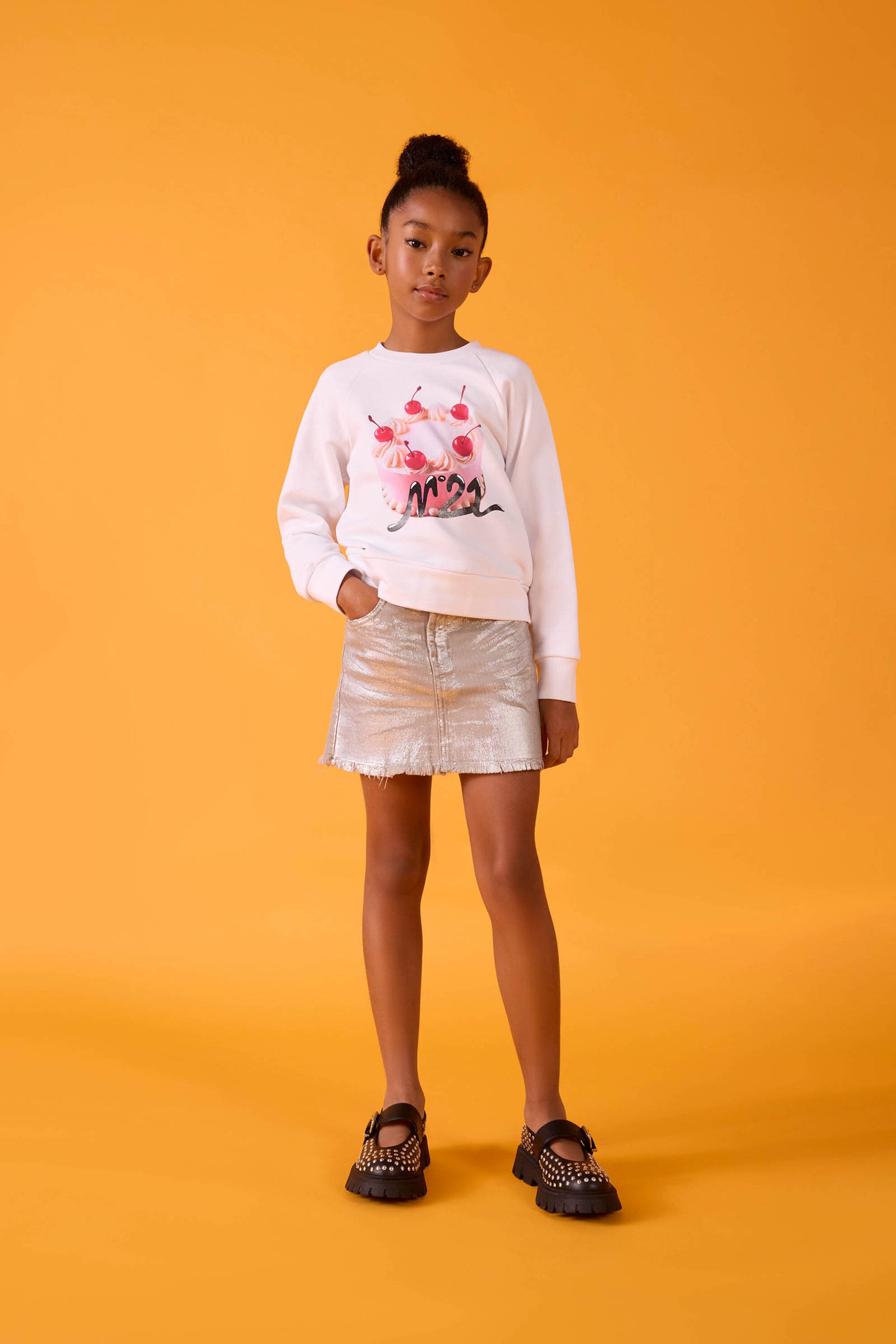 Gonna mini laminata effetto sfrangiato