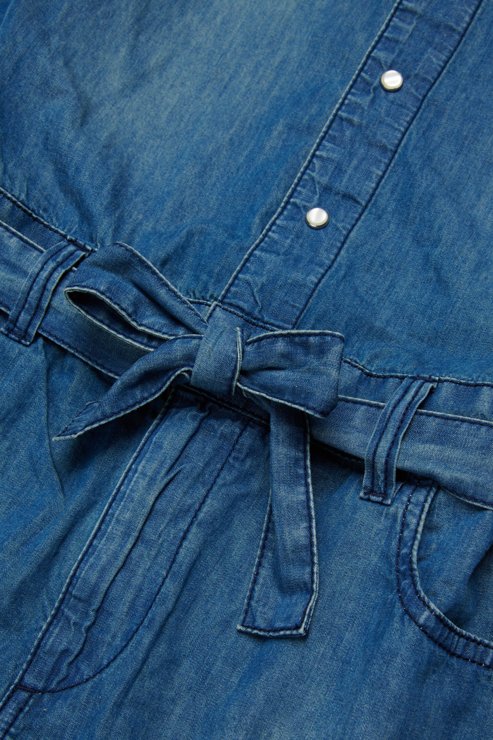 Tuta corta in denim con logo