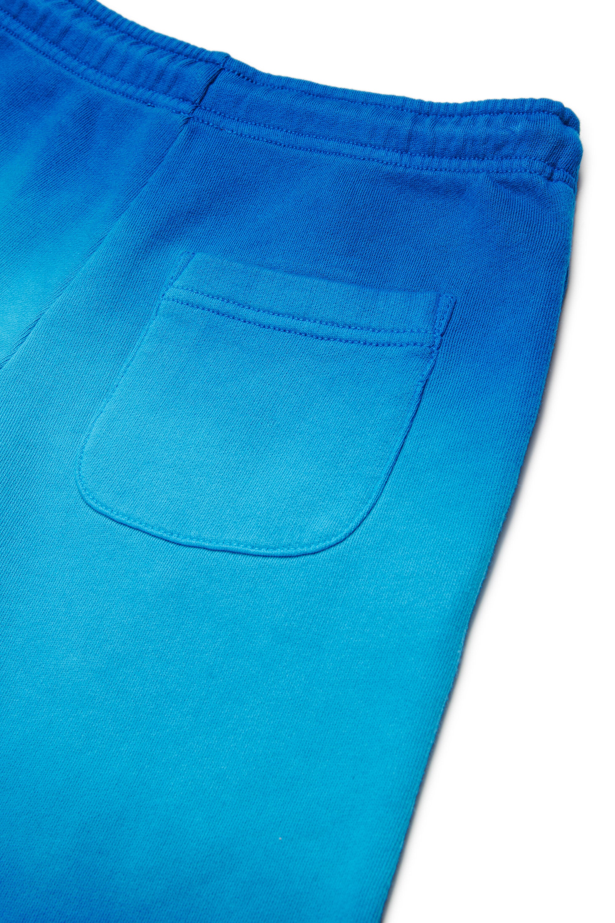 Shorts in felpa con logo