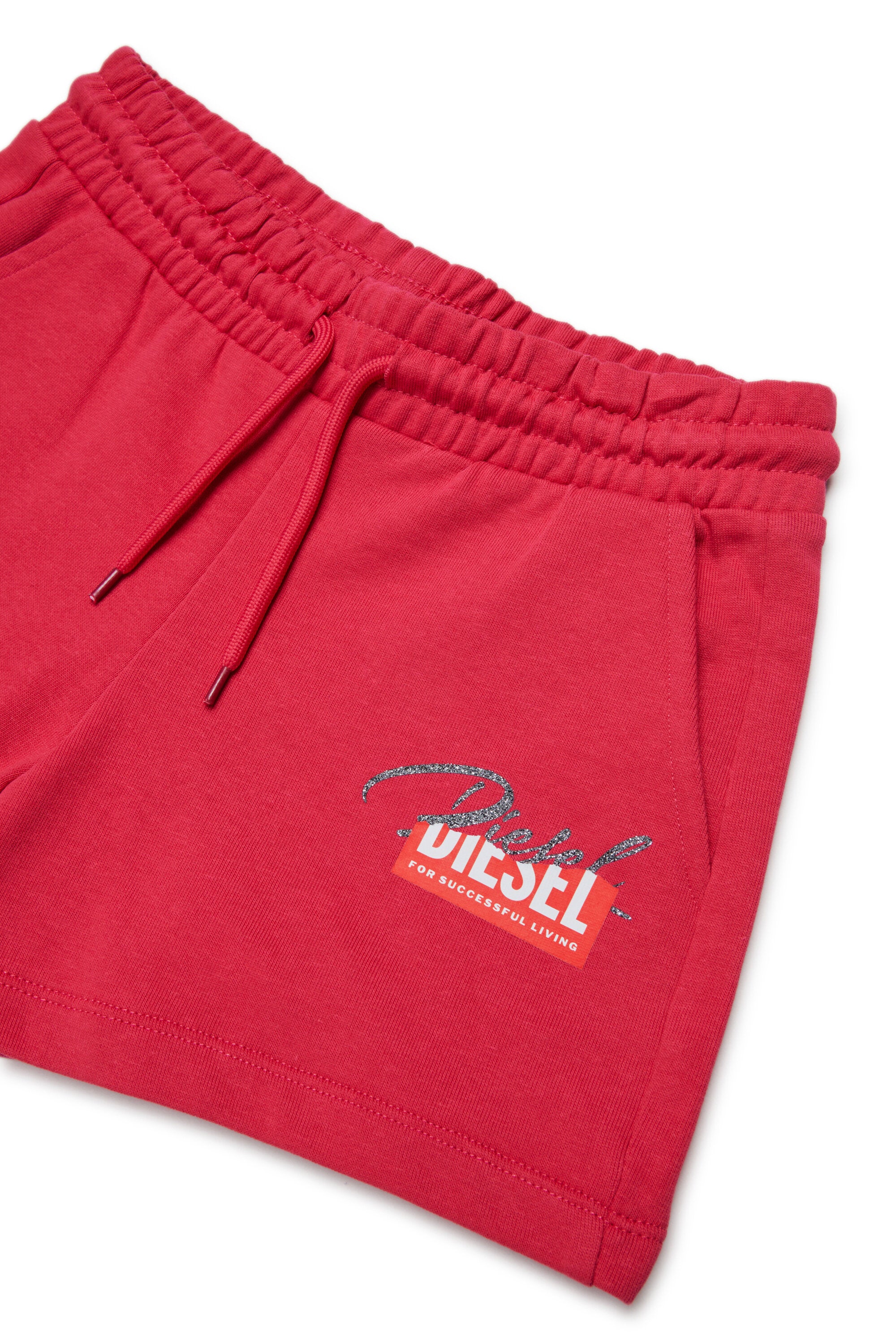 Shorts in felpa con logo