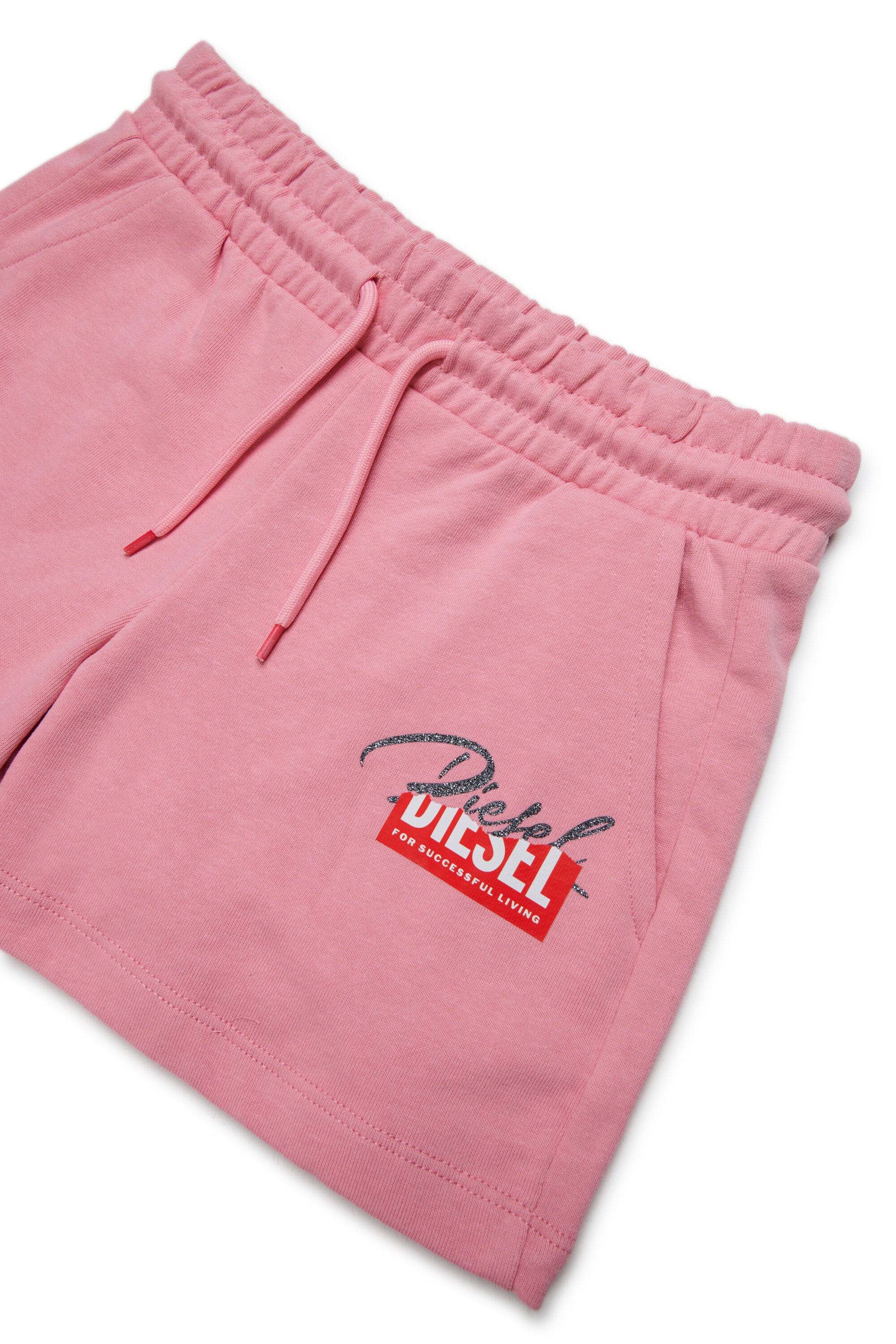 Tuta con logo