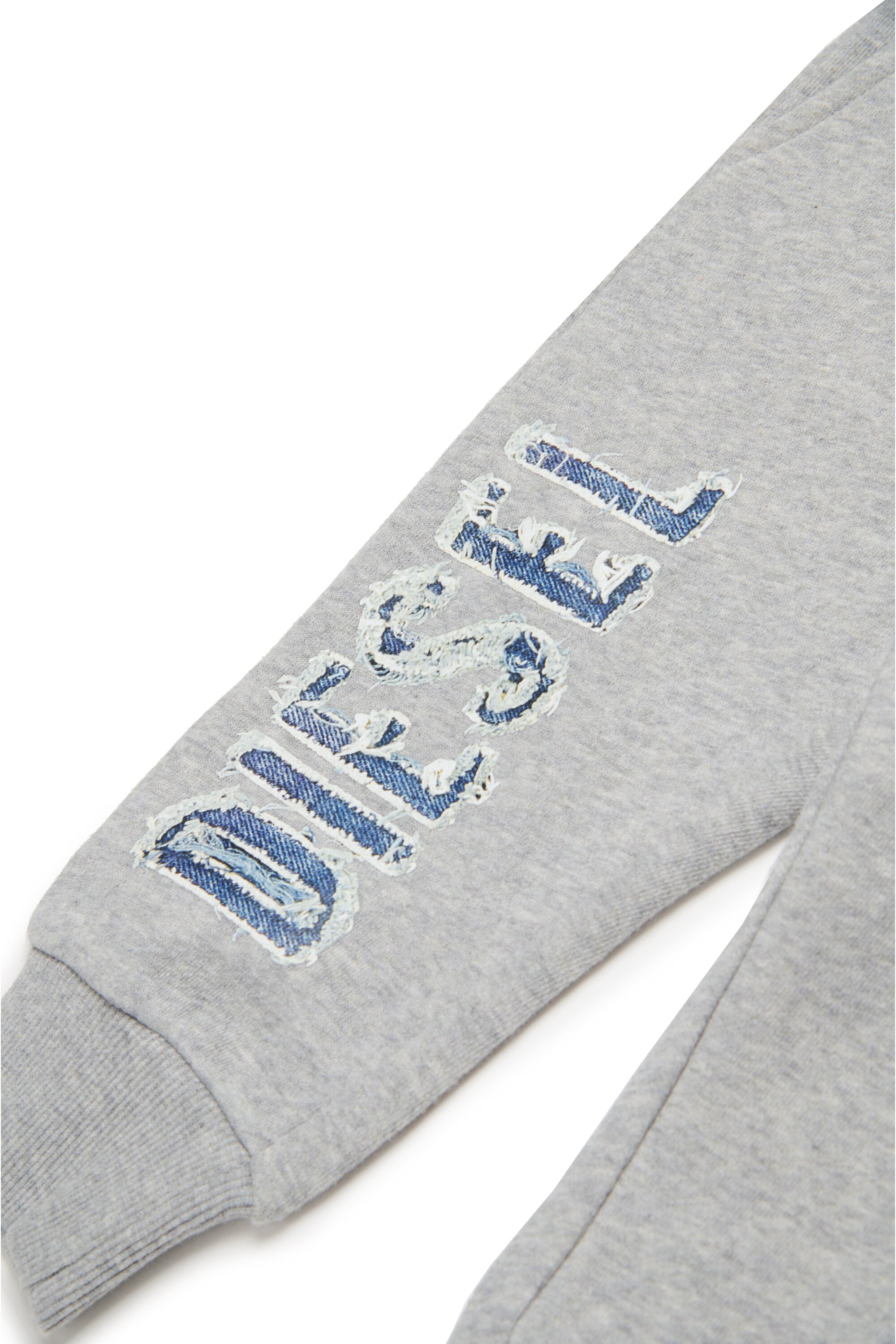 Pantaloni jogger con grafica Diesel effetto denim