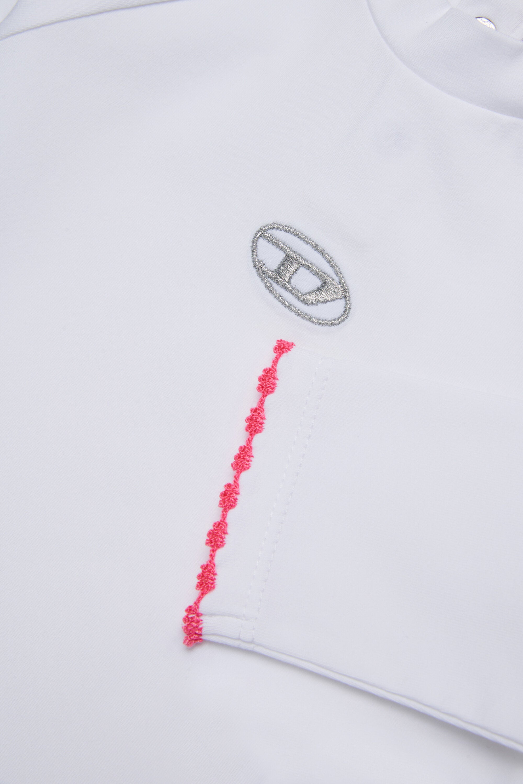 Dolcevita in jersey stretch con logo Oval D lurex