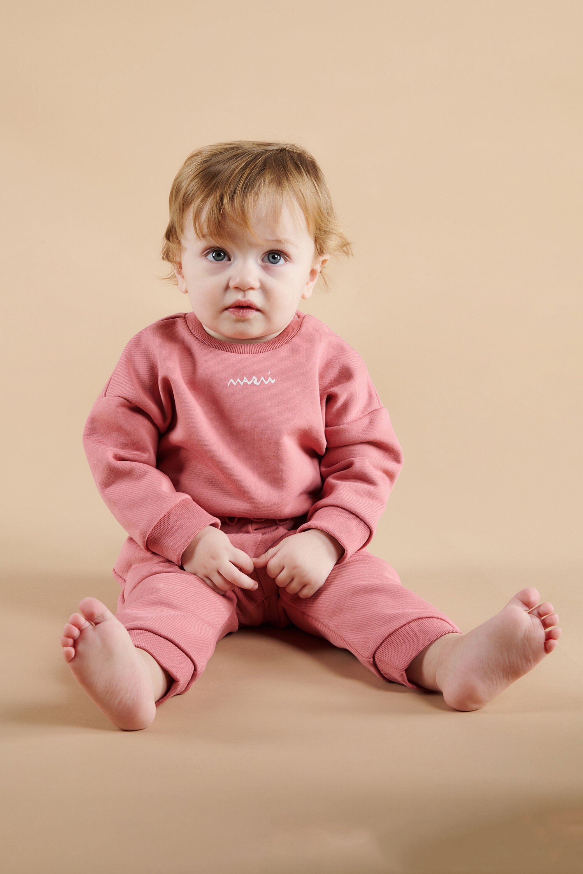 Felpa girocollo con balze sul fondo