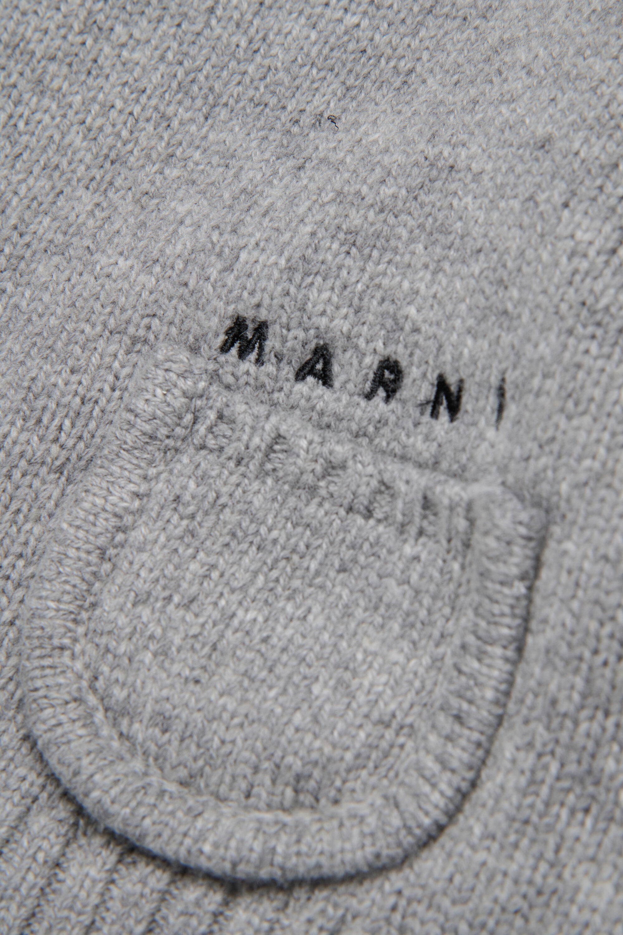 Pullover in misto lana con taschine