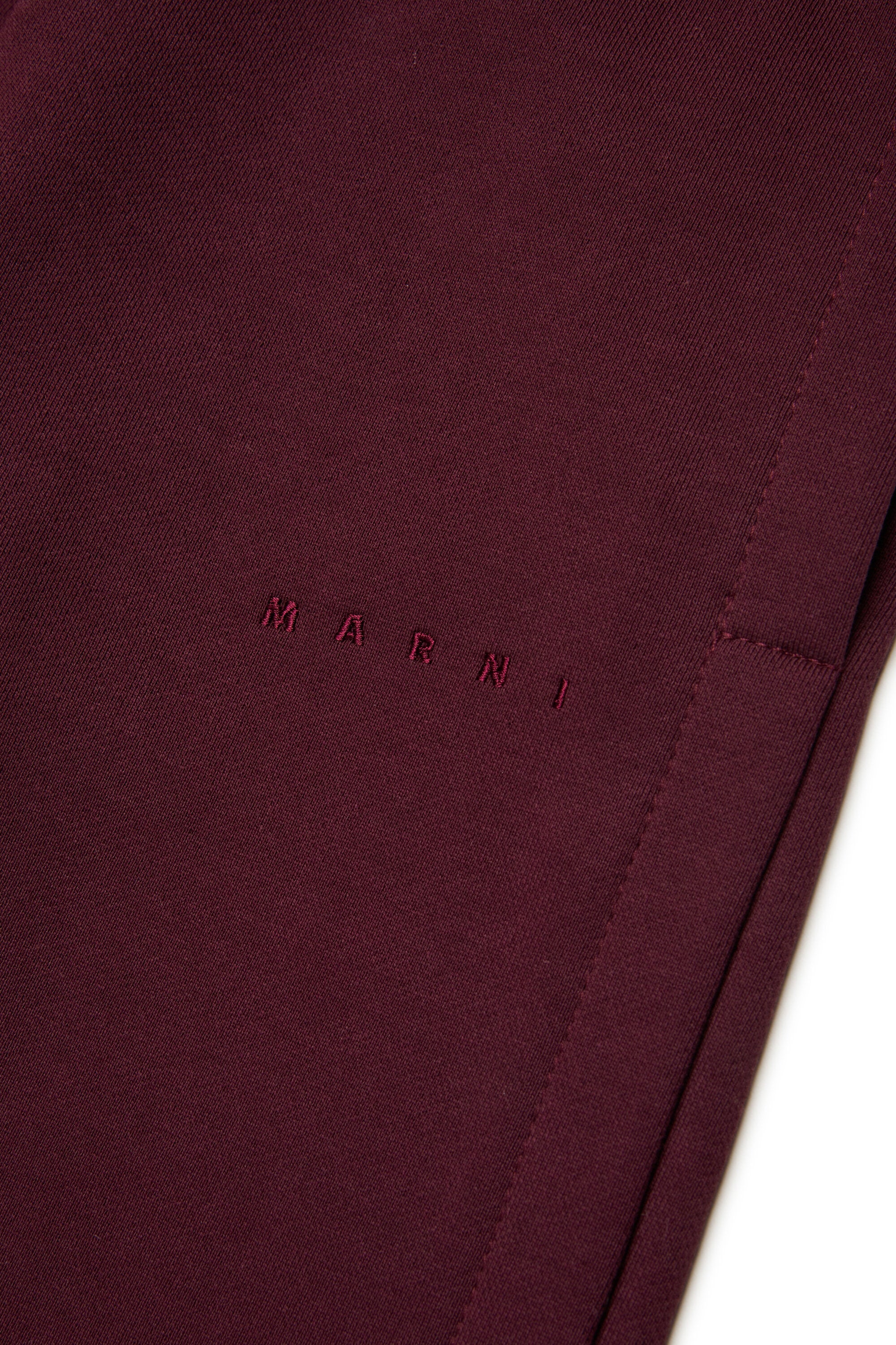 Pantaloni in felpa con apertura laterale