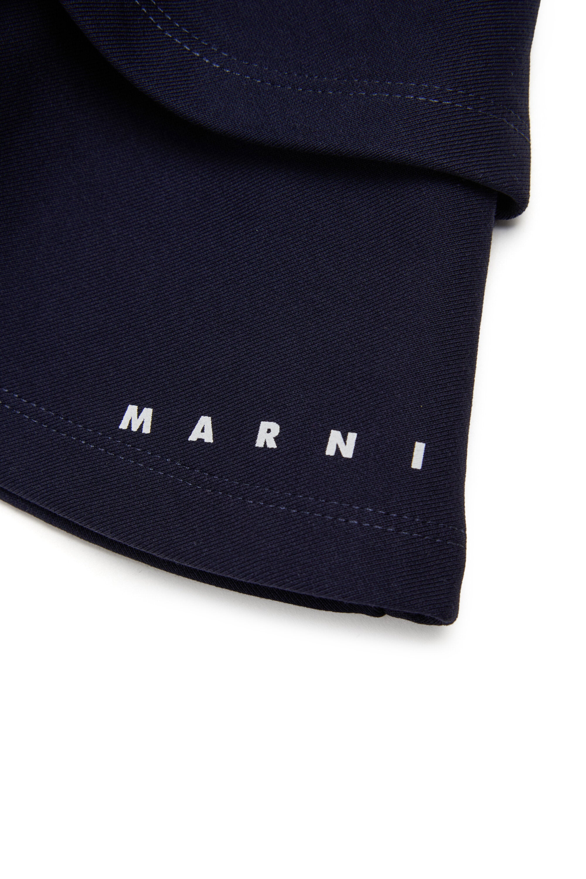 Gonna corta in felpa a balze