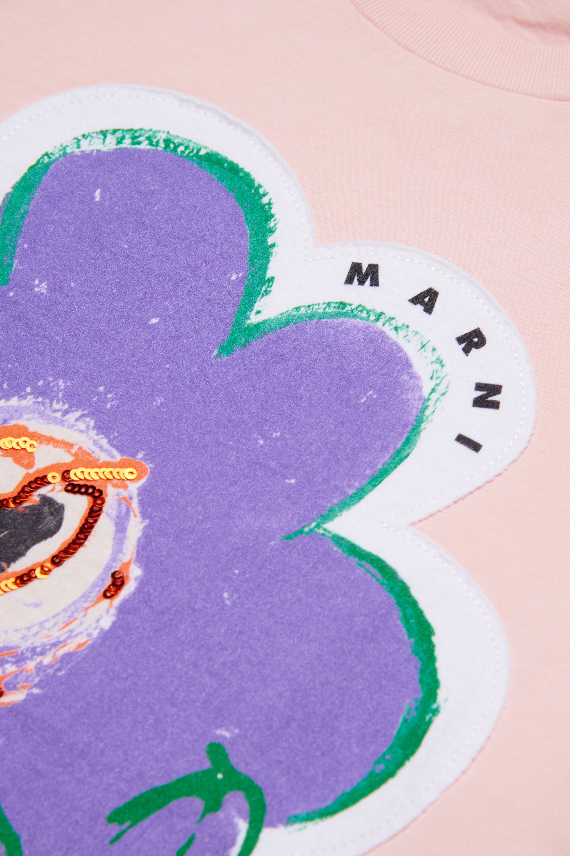 T-shirt con fiore applicato e logo