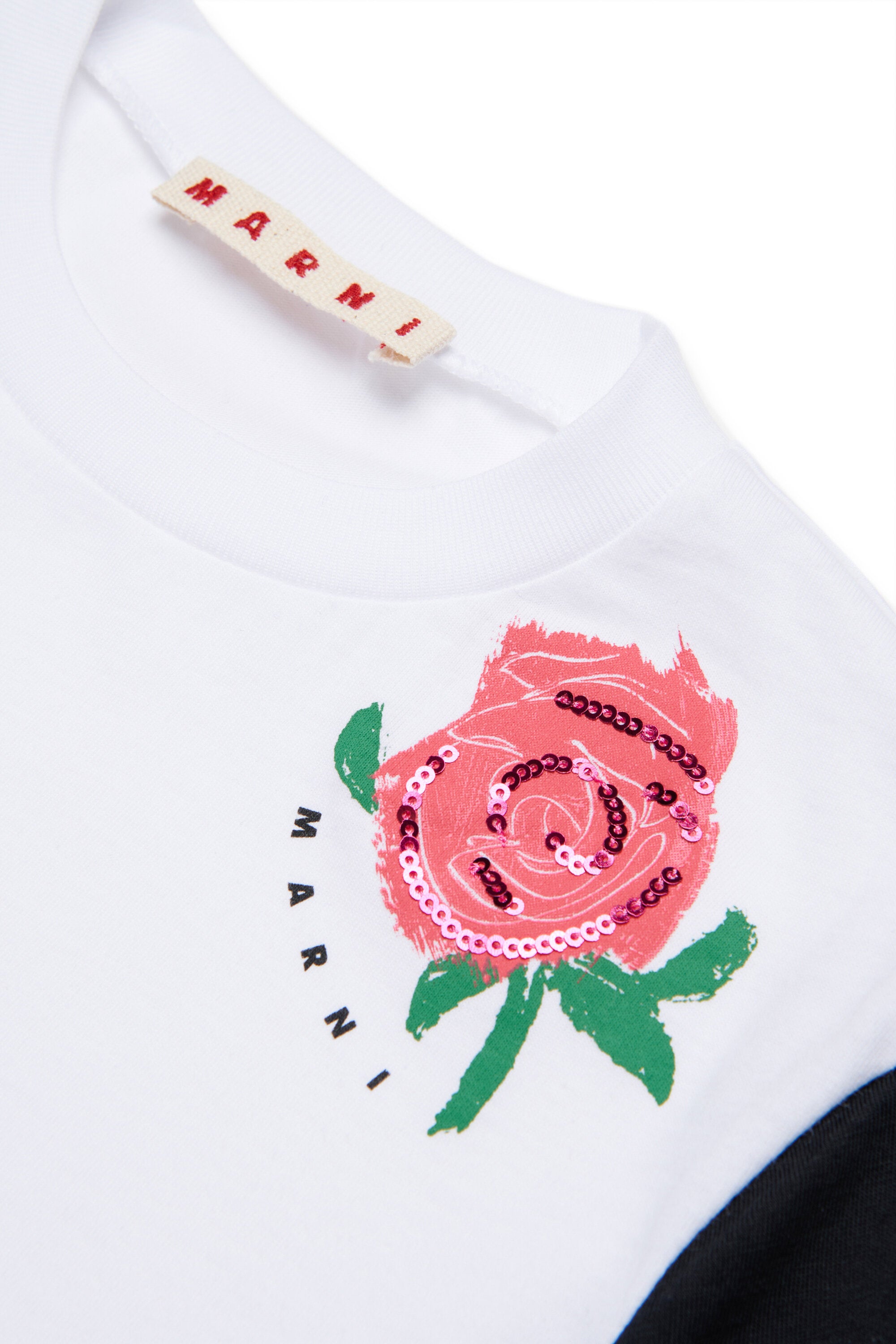 T-shirt con stampa e paillettes