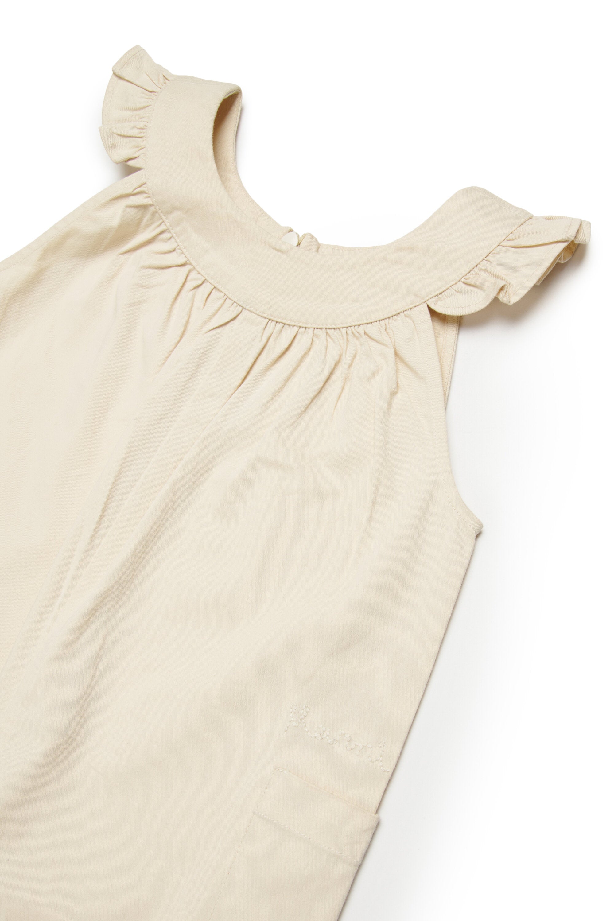 Combinaison avec volants sur les épaules