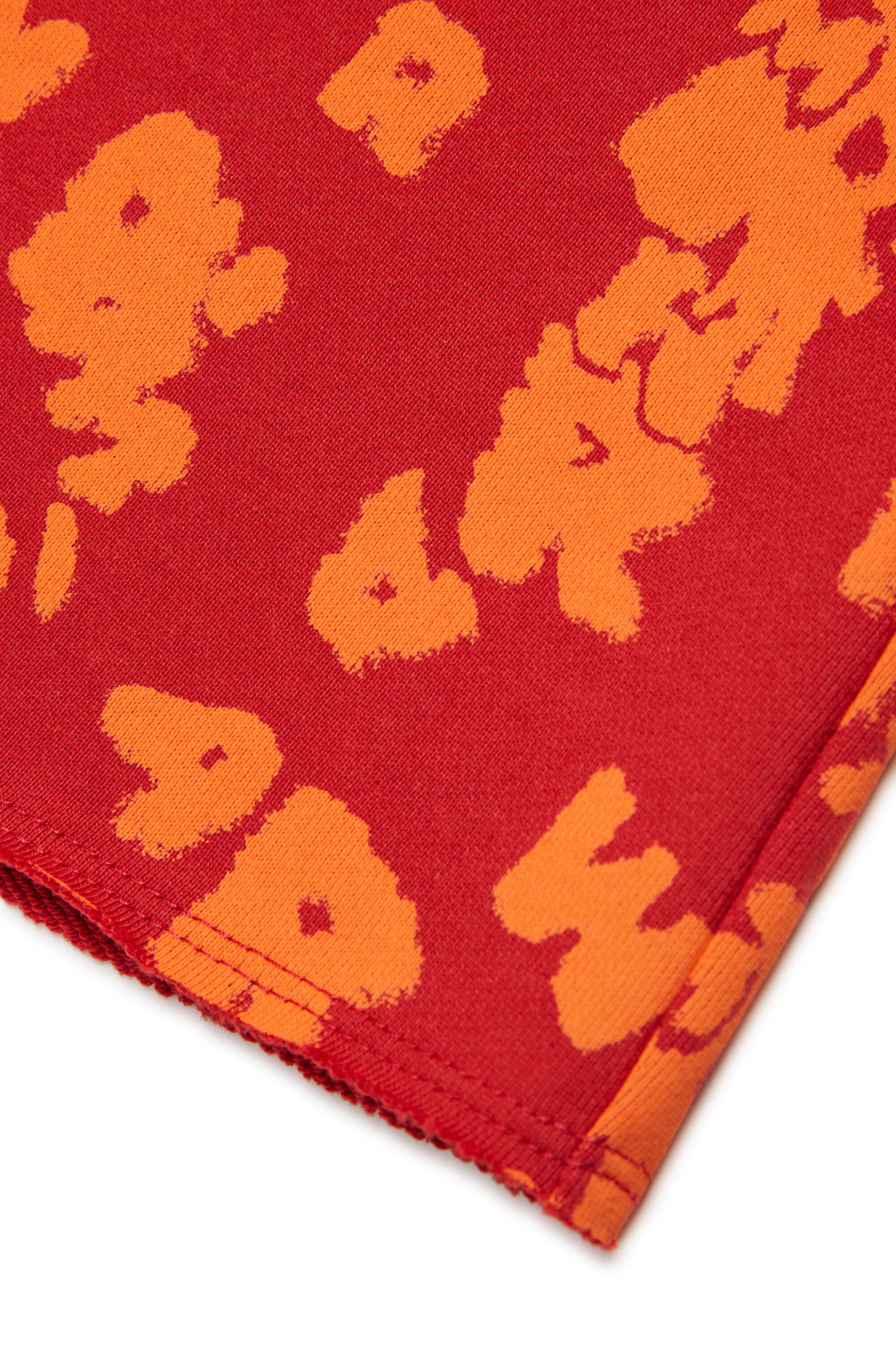 Fleece shorts with all-over logo