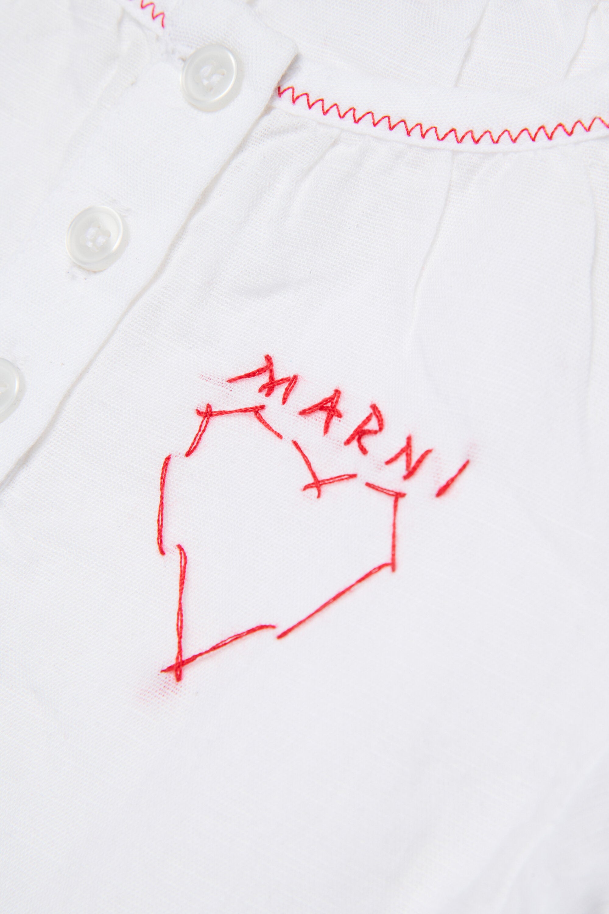 Short dress with embroidered logo and heart