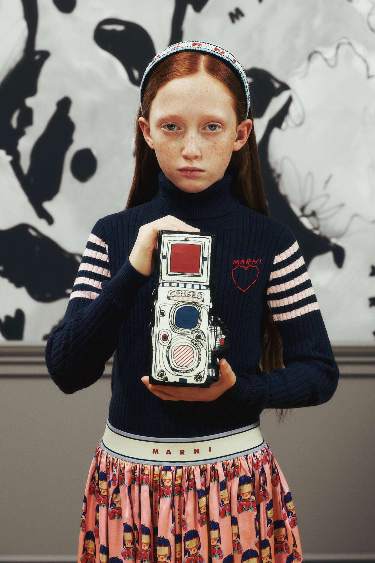Ribbed turtleneck with heart pattern