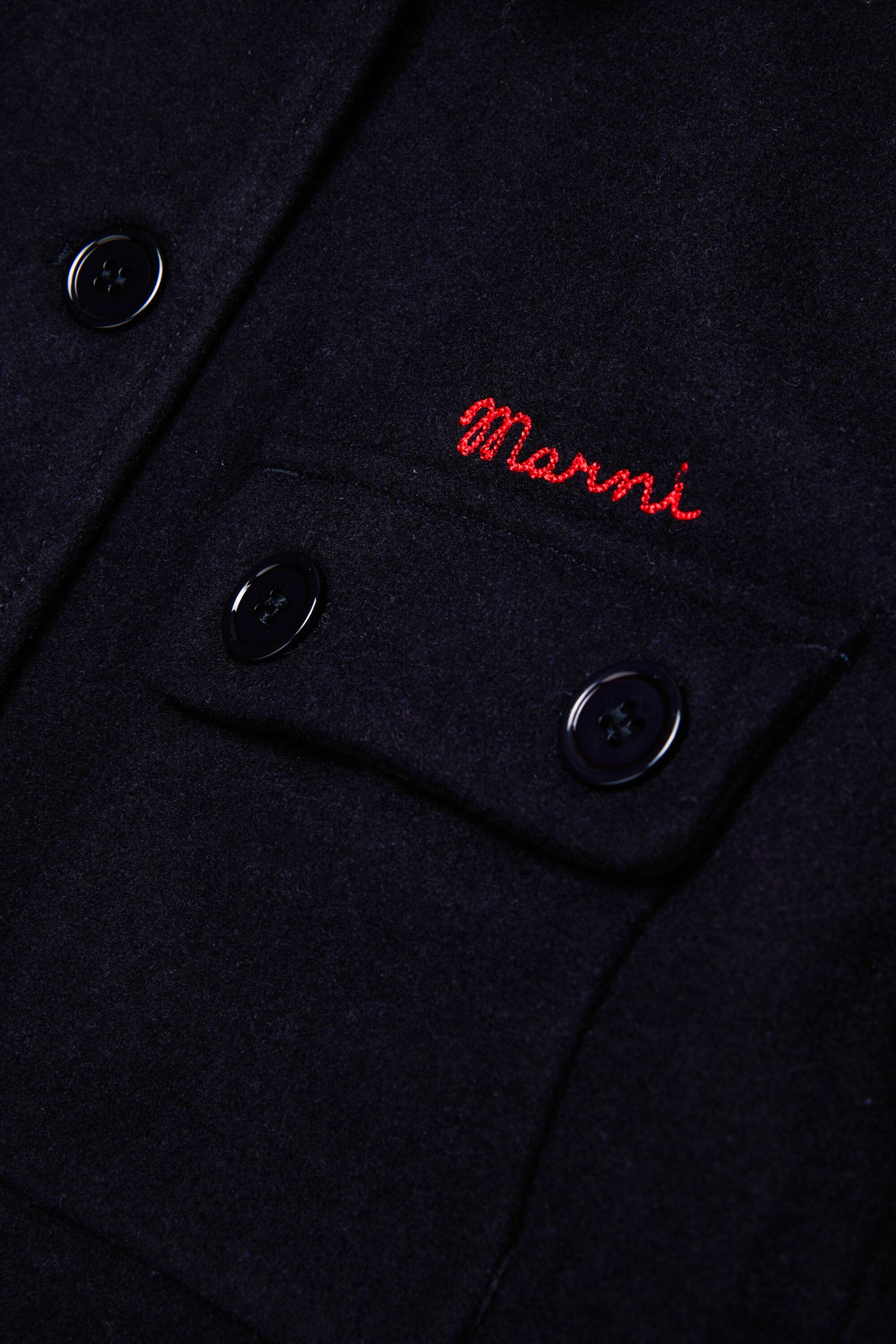 Coat with logo