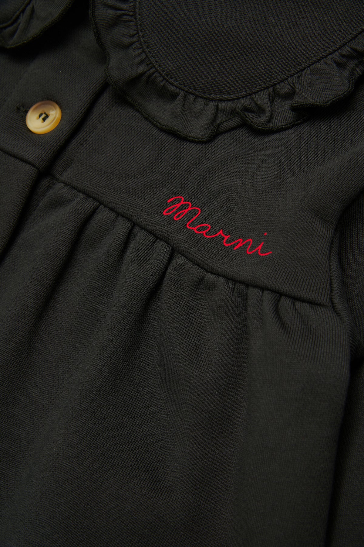 Jacket with logo and ruffles