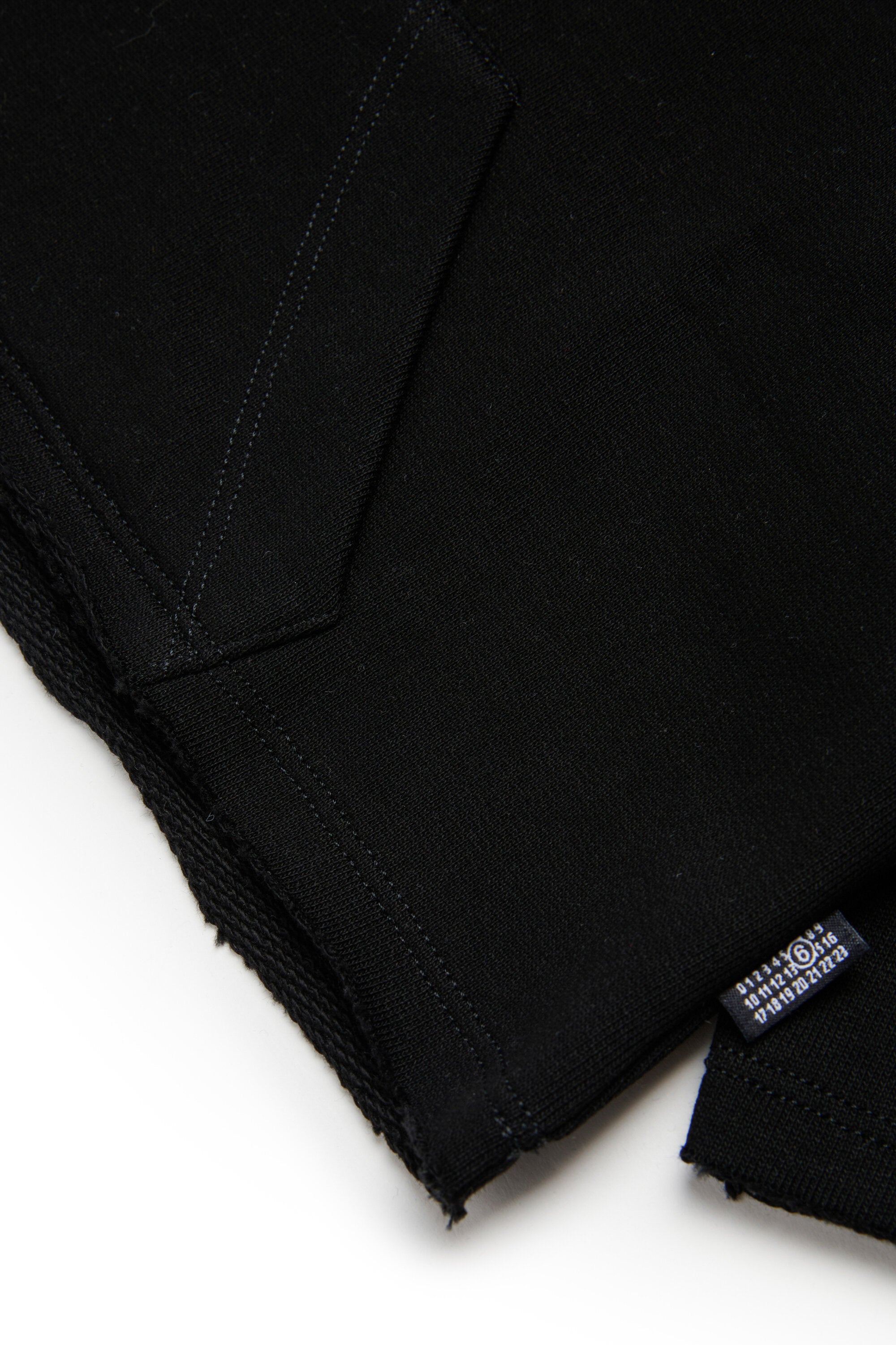 Sweat-shirt à capuche avec ourlet coupé à vif