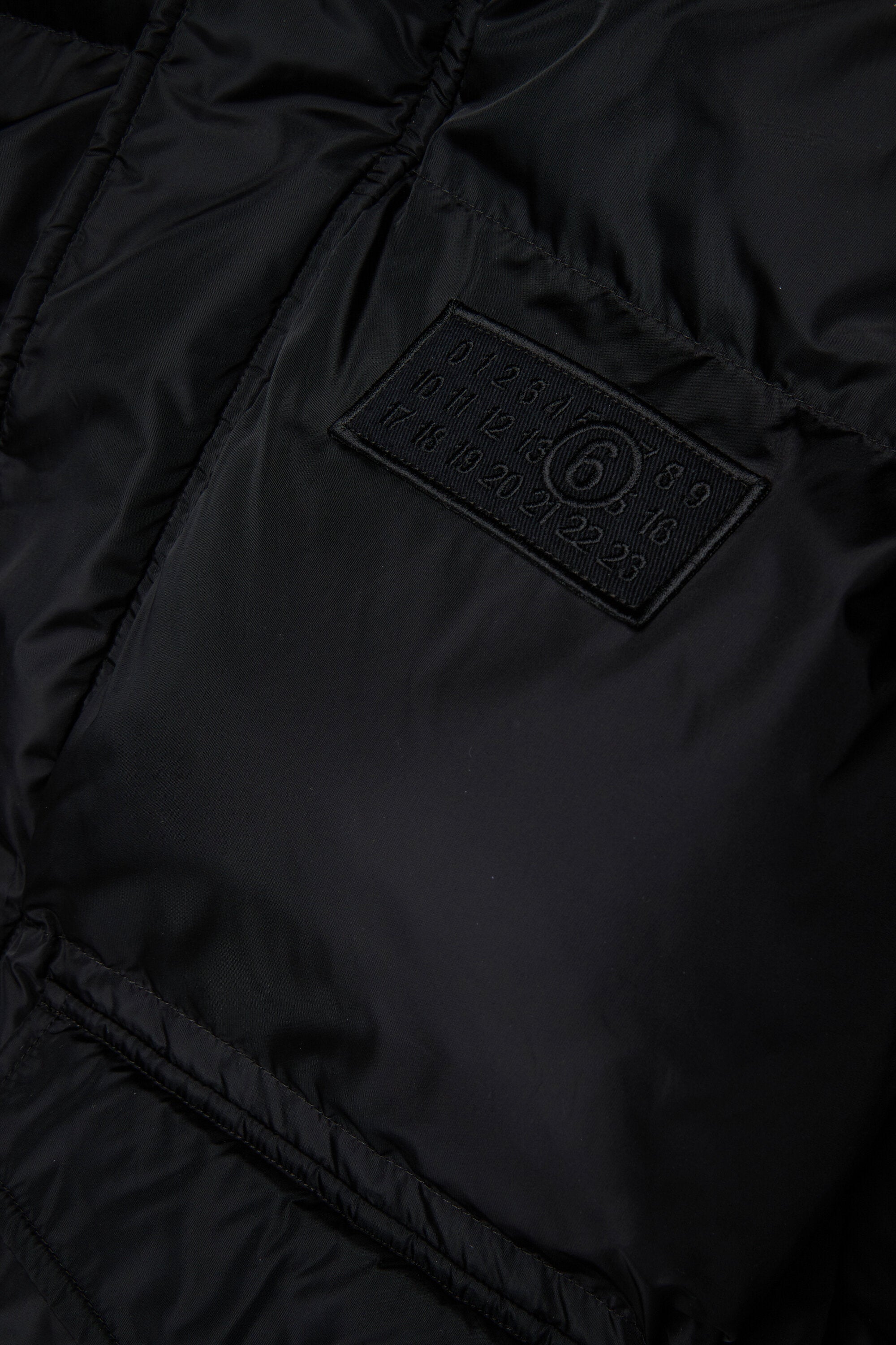 Chaqueta larga acolchada con bolsillos