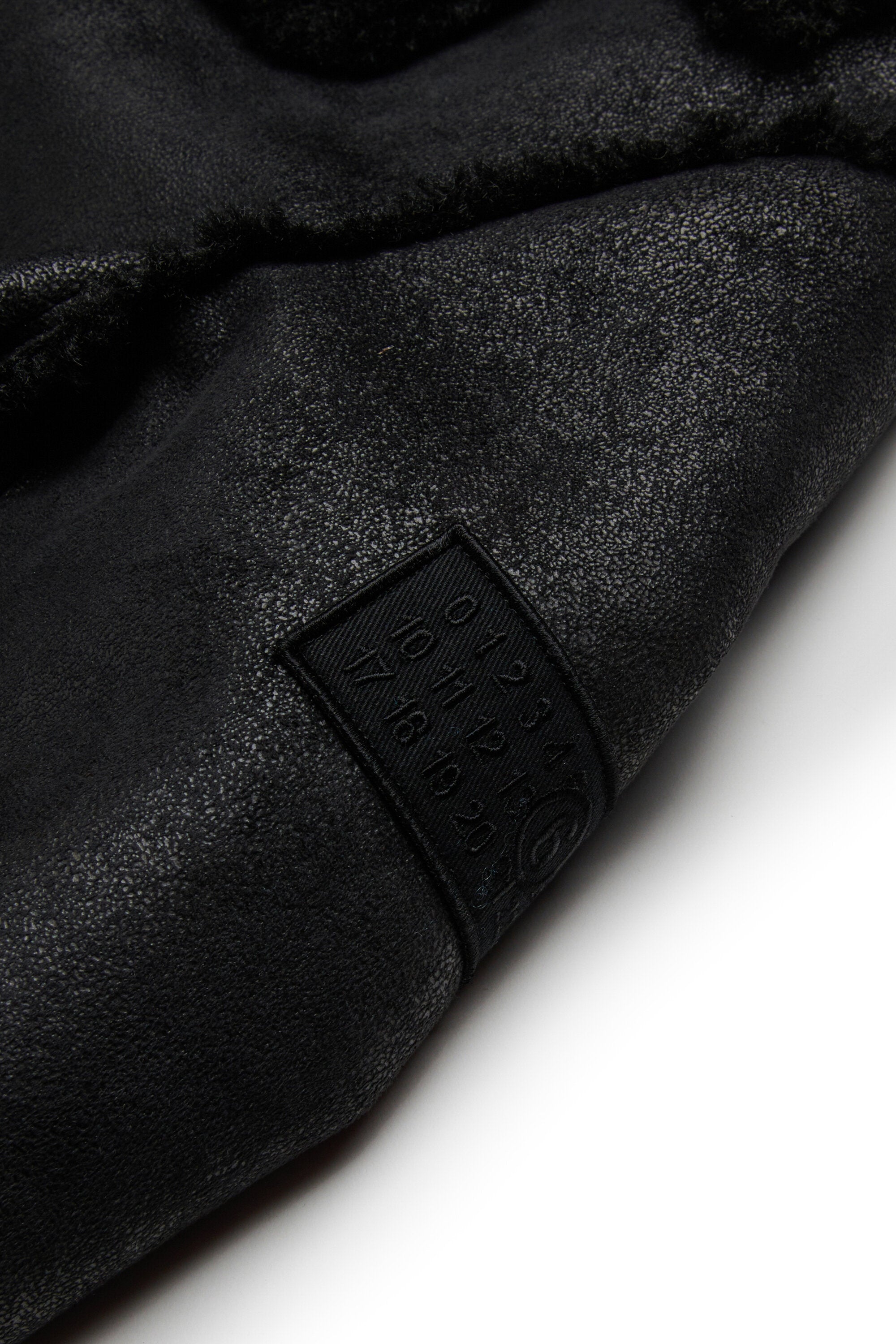 Jacke im Scherenschnitt mit Teddydetails