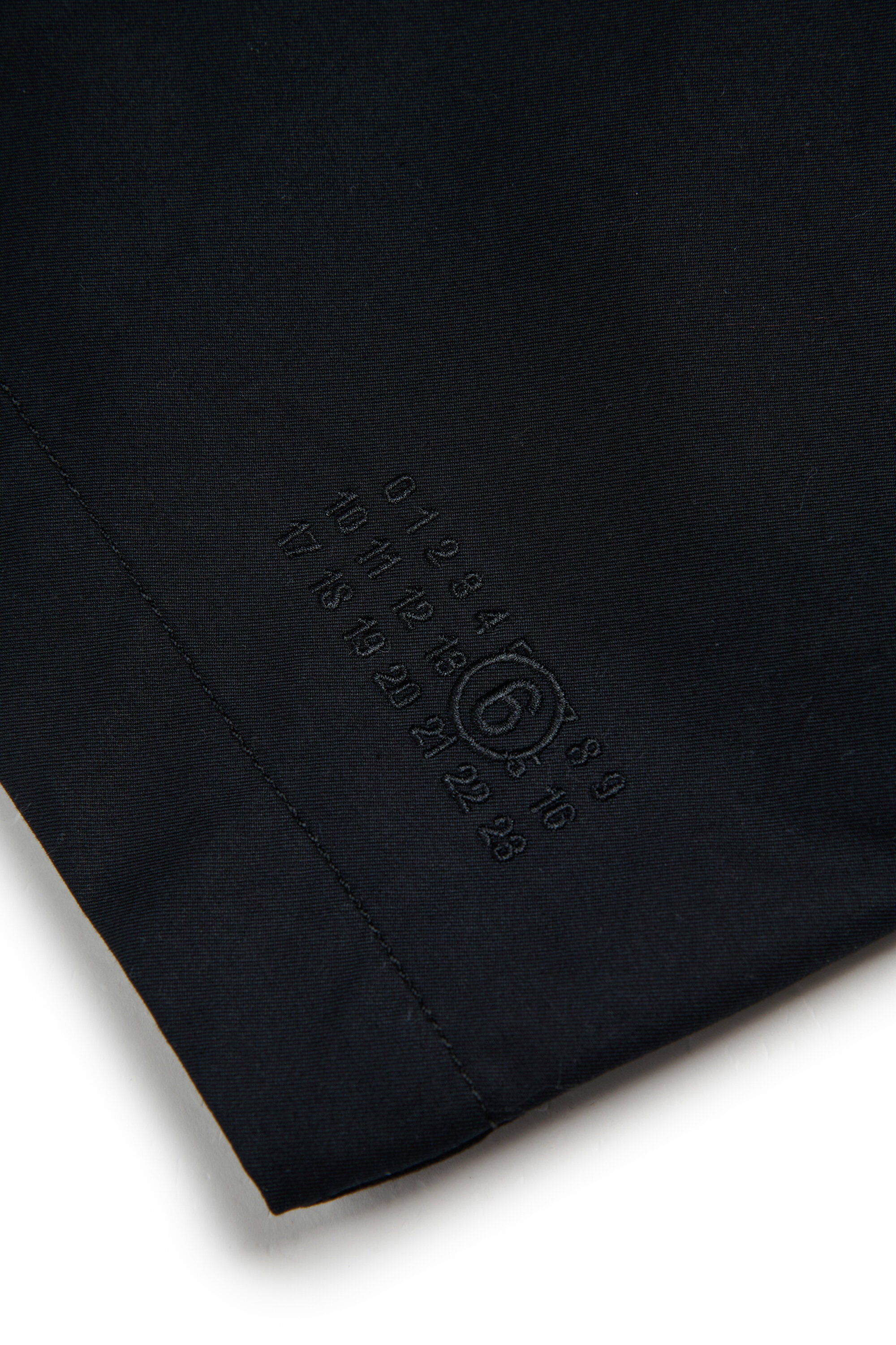 Manteau droit avec logo