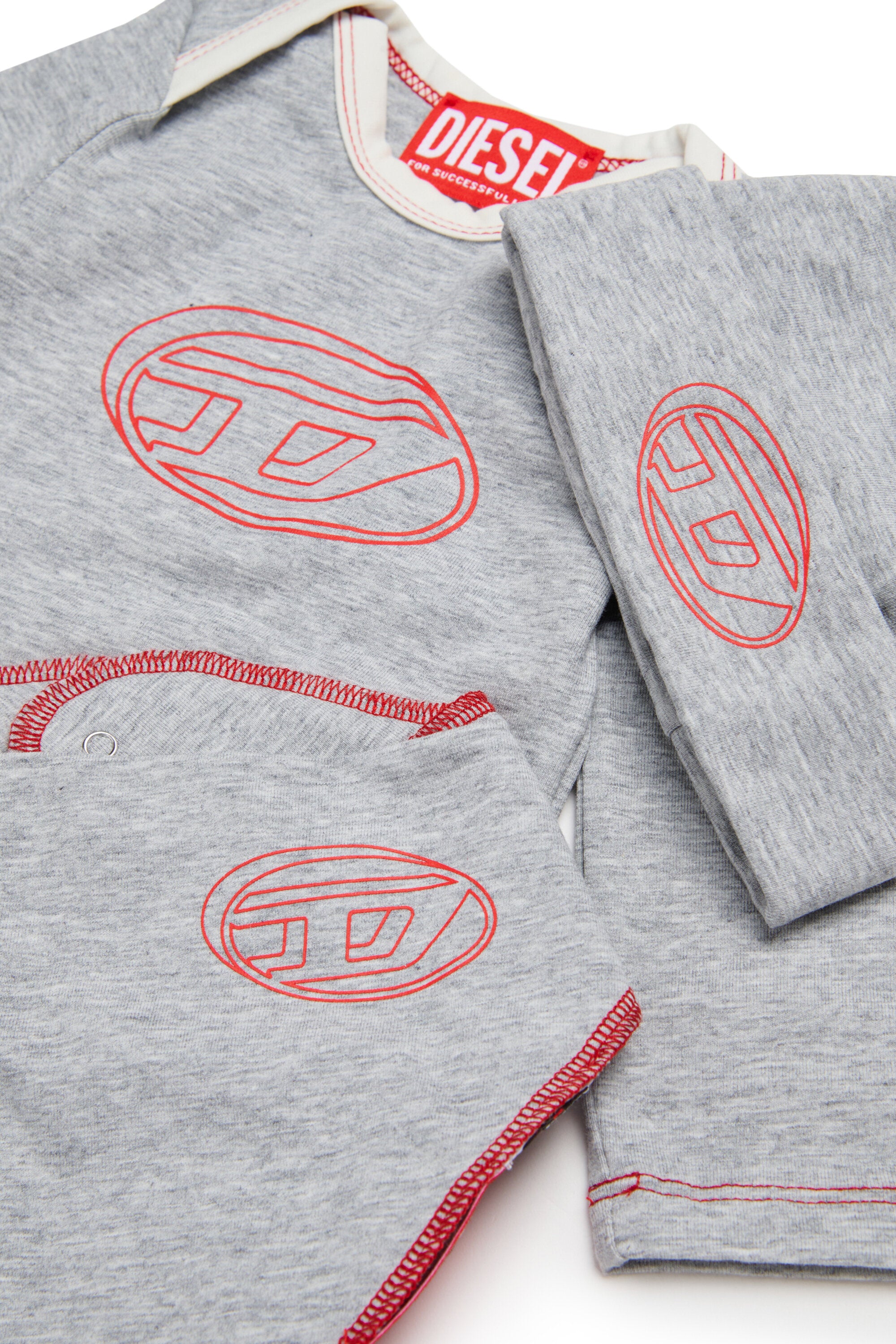 Set nascita in jersey stretch con logo Oval D