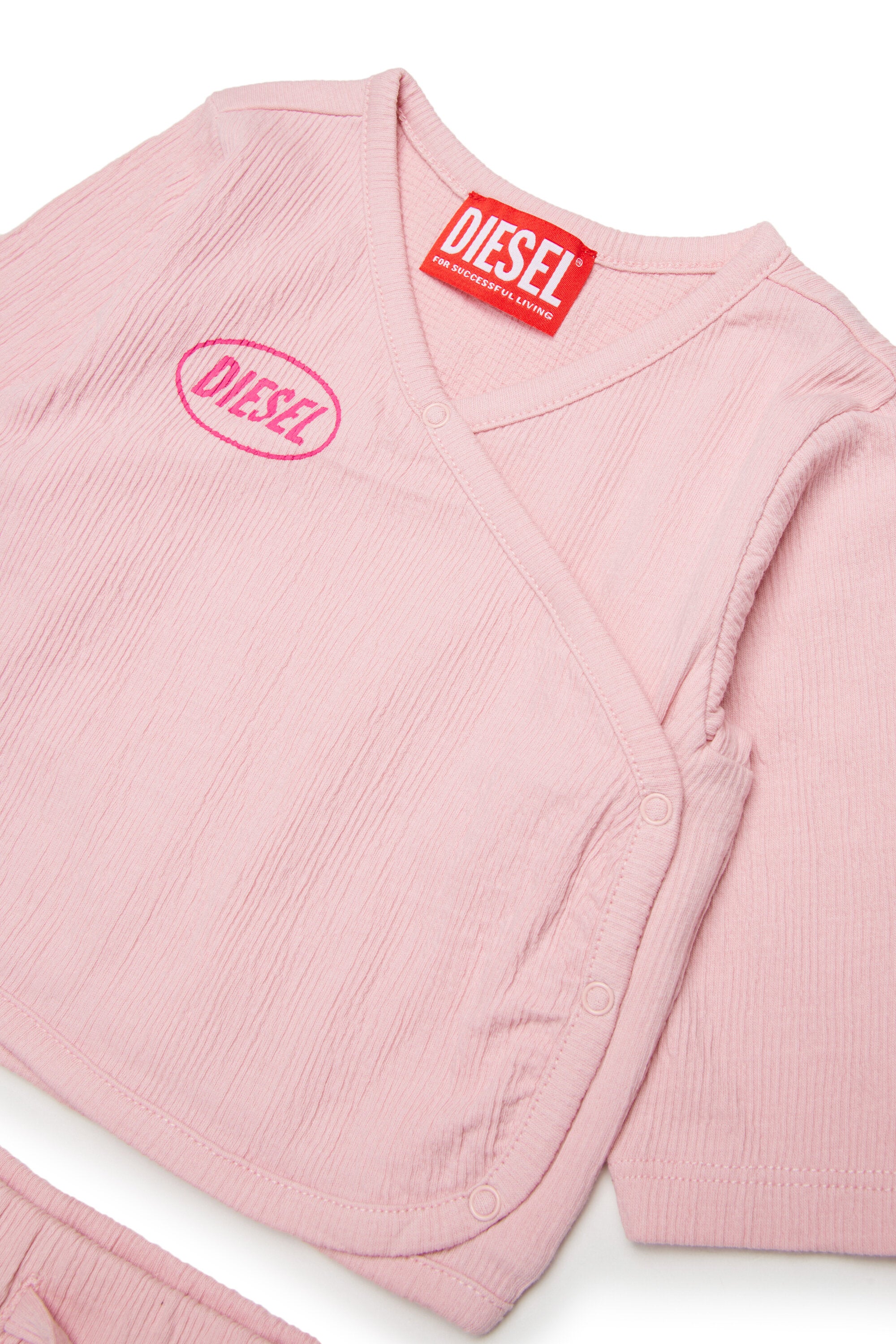 Combinaison bébé avec logo