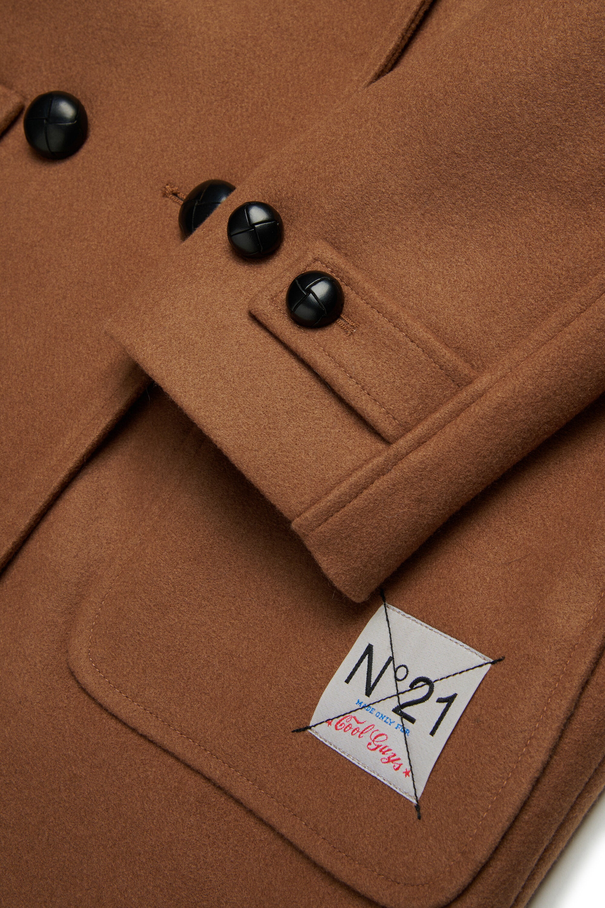 Manteau en tissu ovoïde à double boutonnage