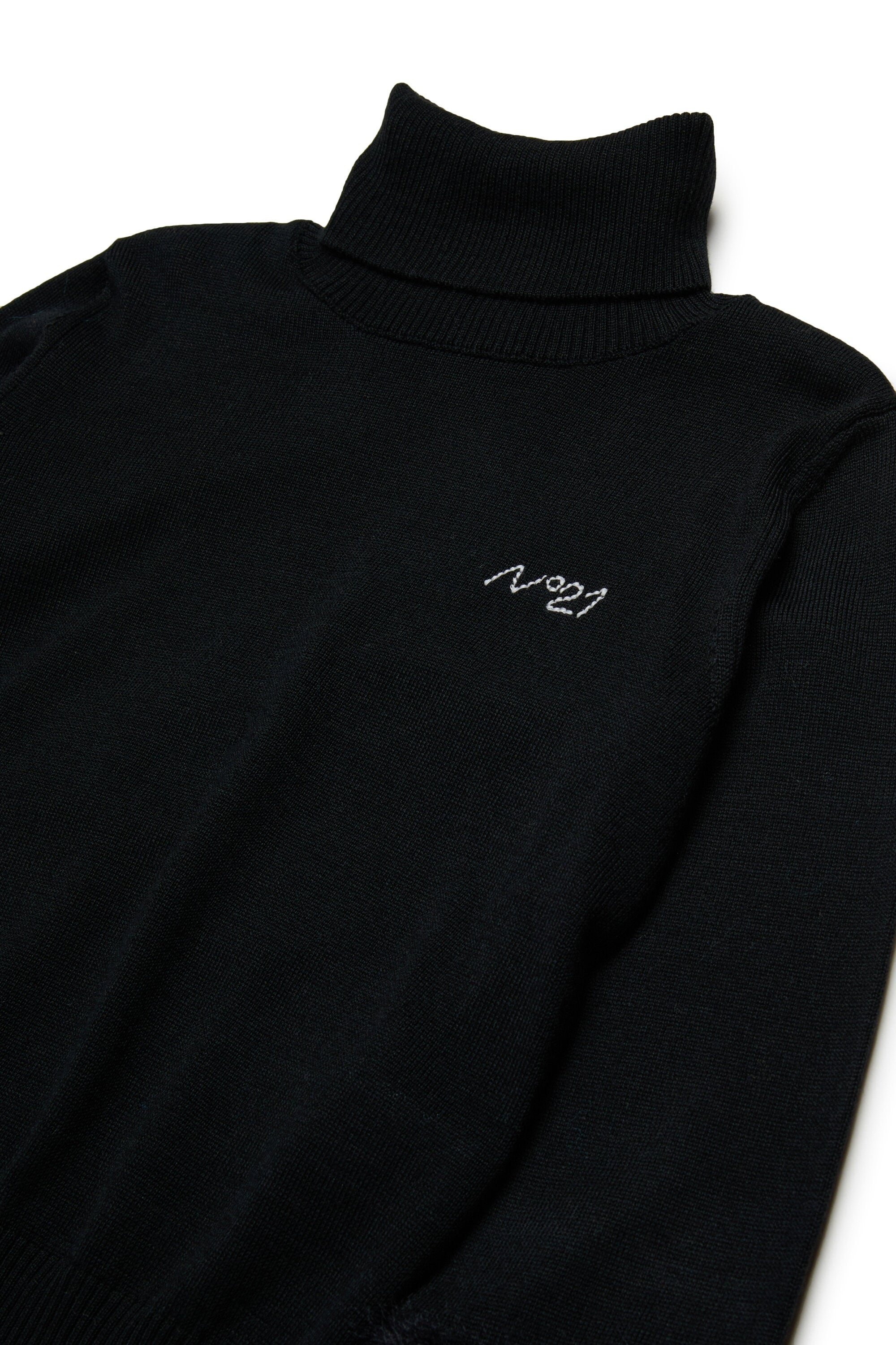 Col roulé en laine avec fausse fourrure sur les manches