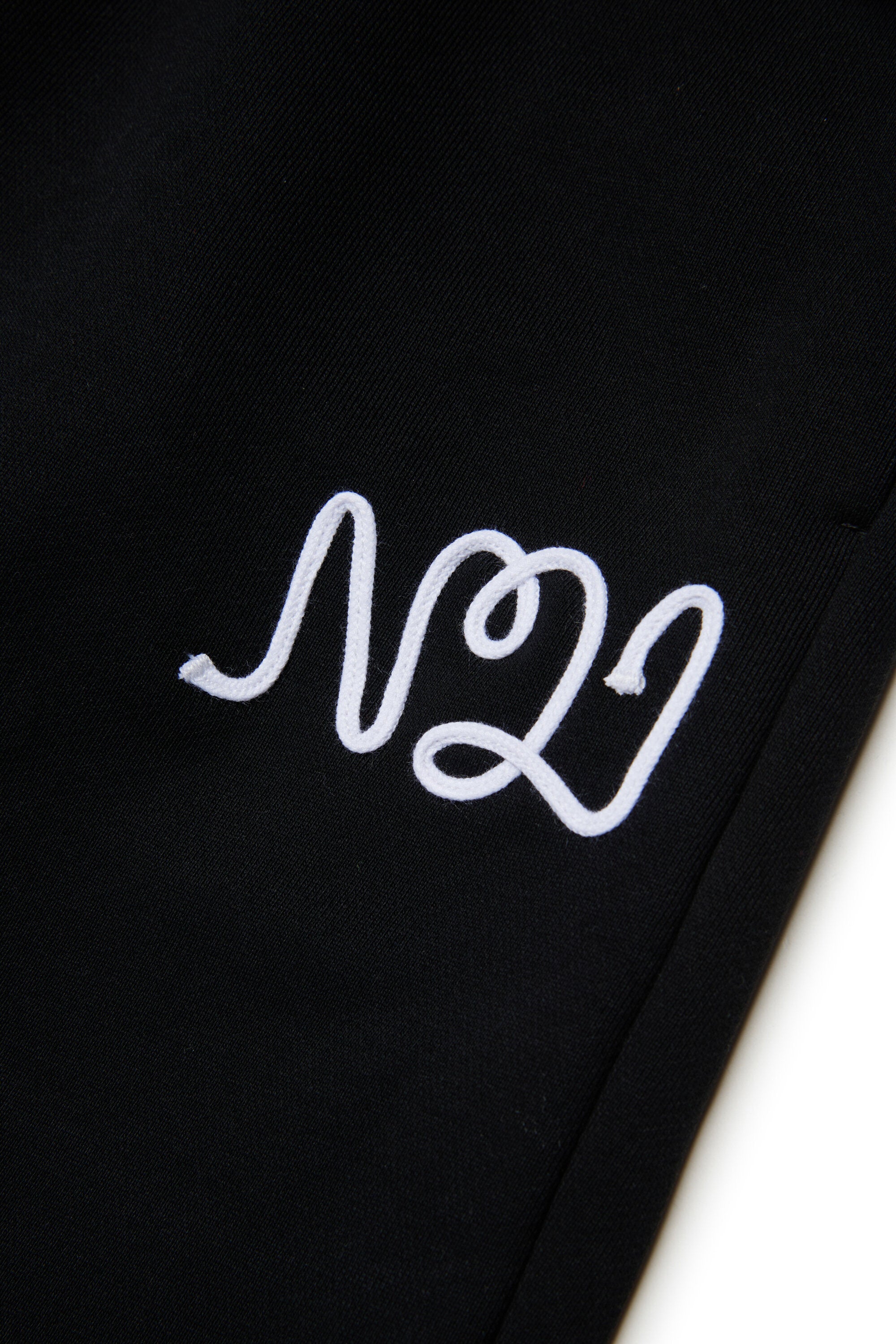 Fleece jogger pants with cursive logo