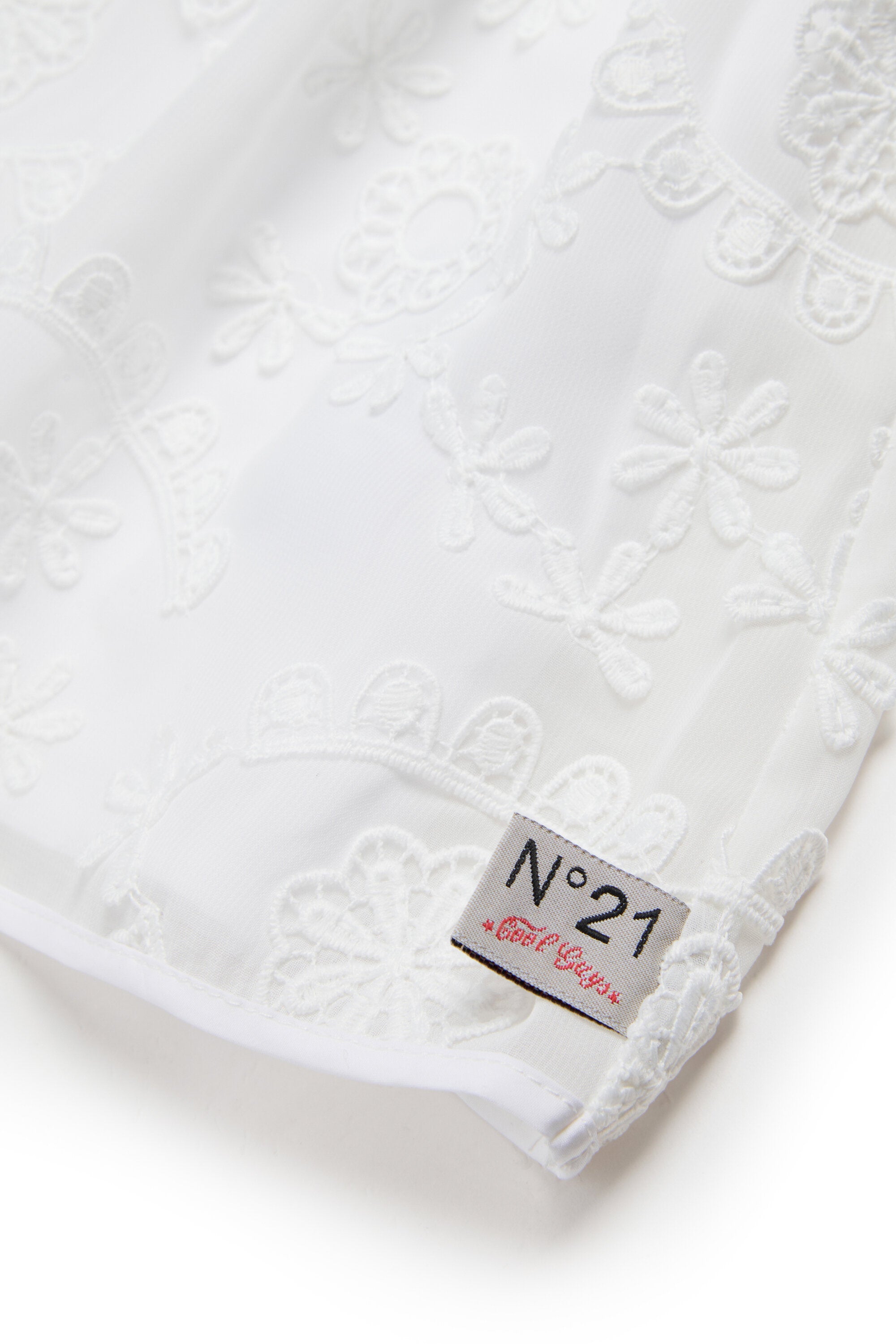 Abito senza maniche con ricamo