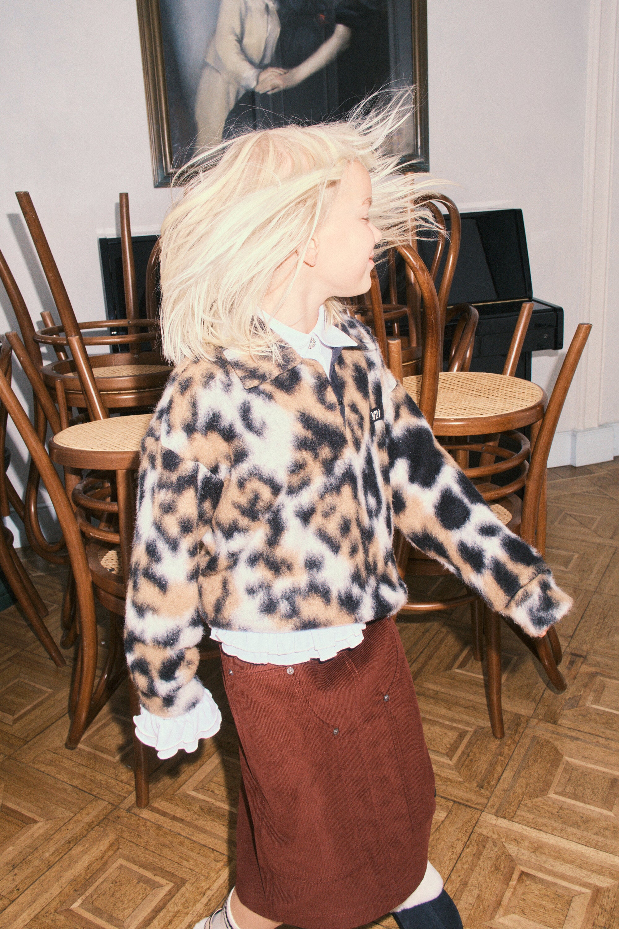 Animal print pullover with collar