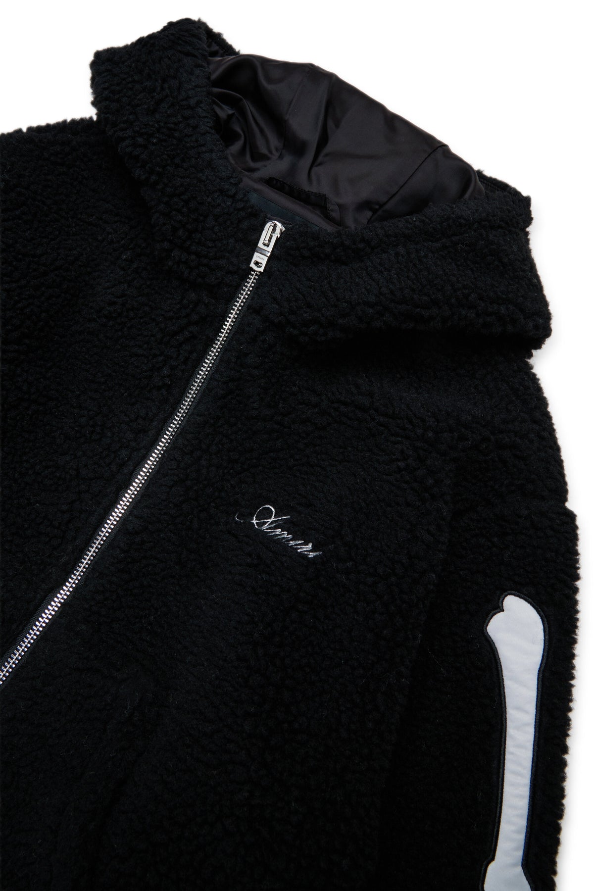 Chaqueta teddy con detalles de huesos