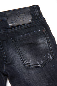Slim straight black jeans shaded with leather patch and spots