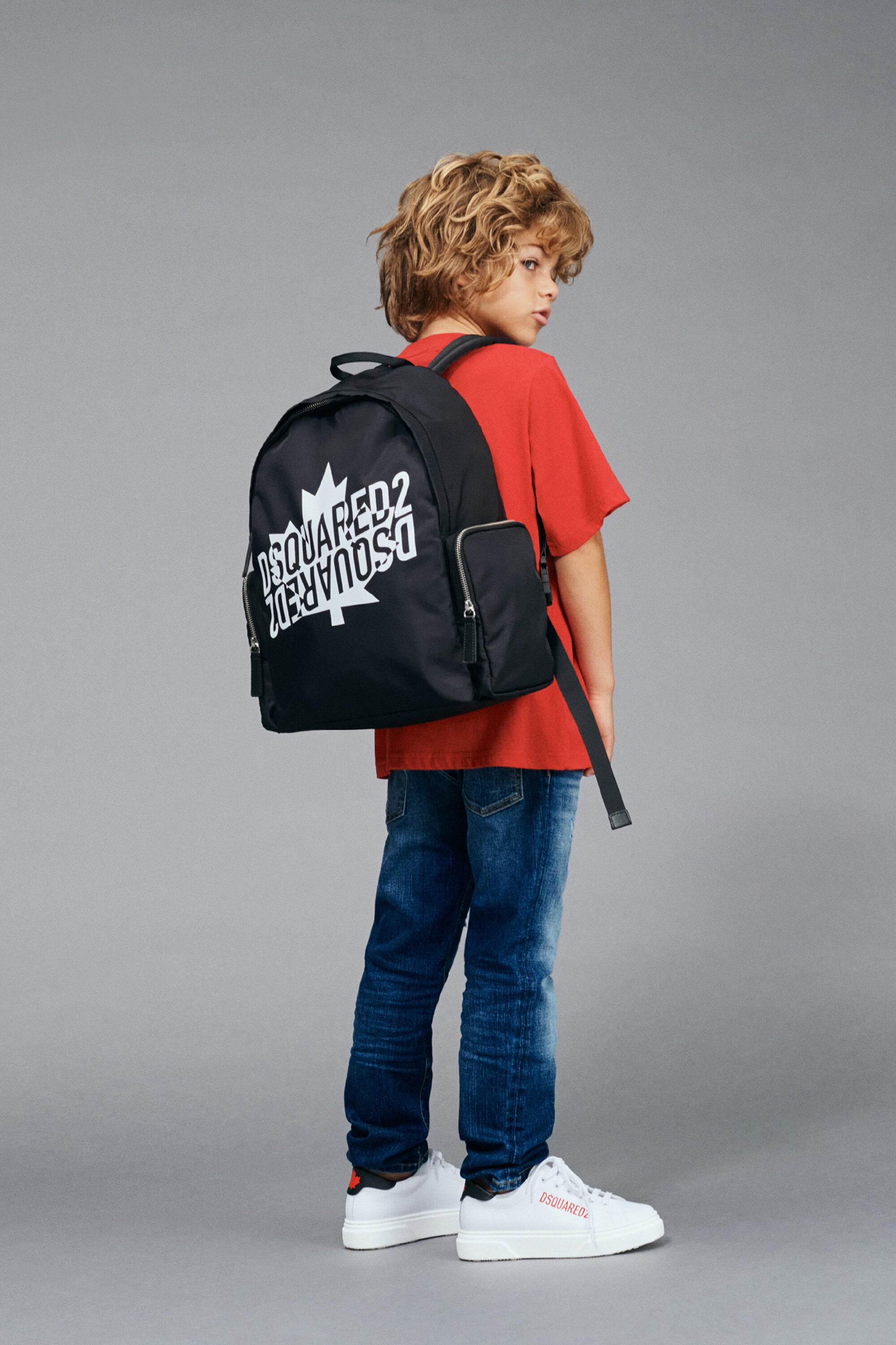 Backpack with side pockets and mirrored logo
